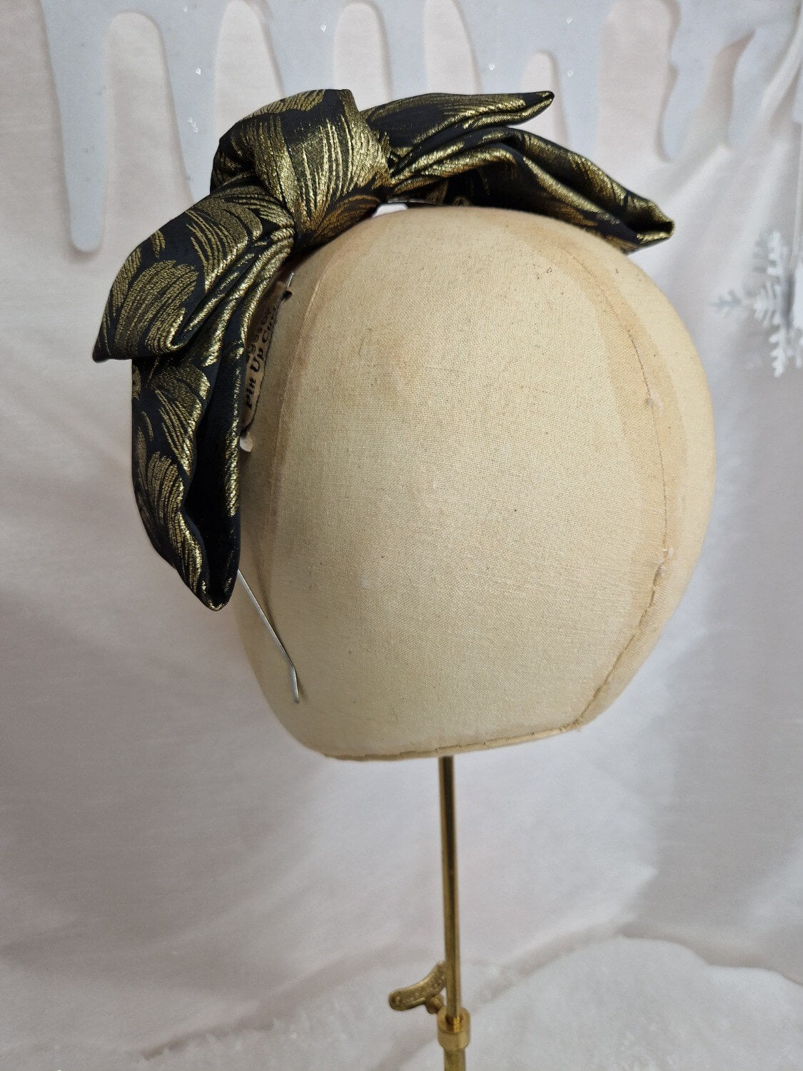 Gold and black lurex jacquard bow