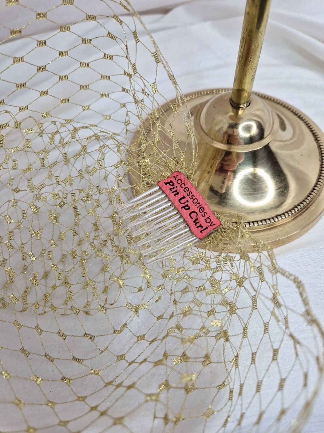 Gold metallic birdcage veil