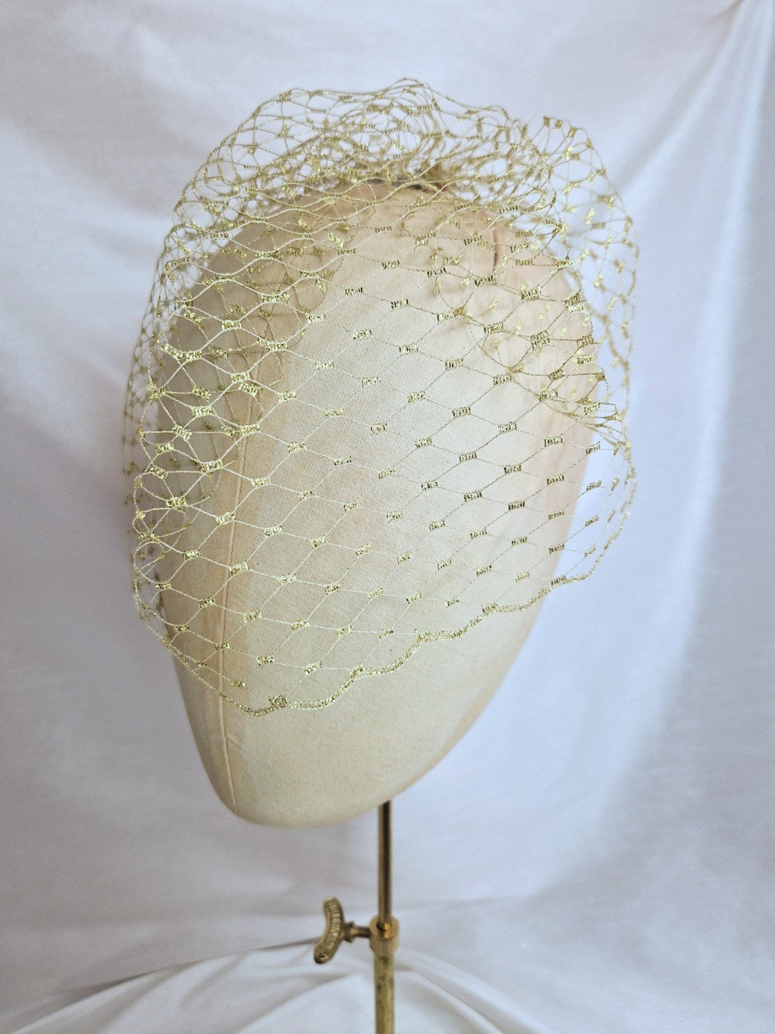 Gold metallic birdcage veil