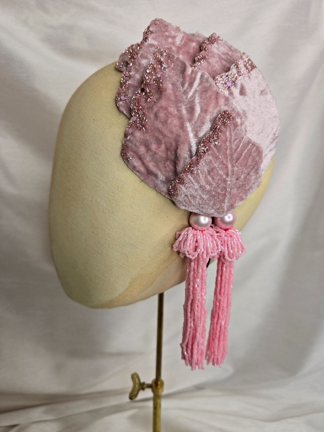 Pale pink velvet petal half hat fascinator with beaded tassels