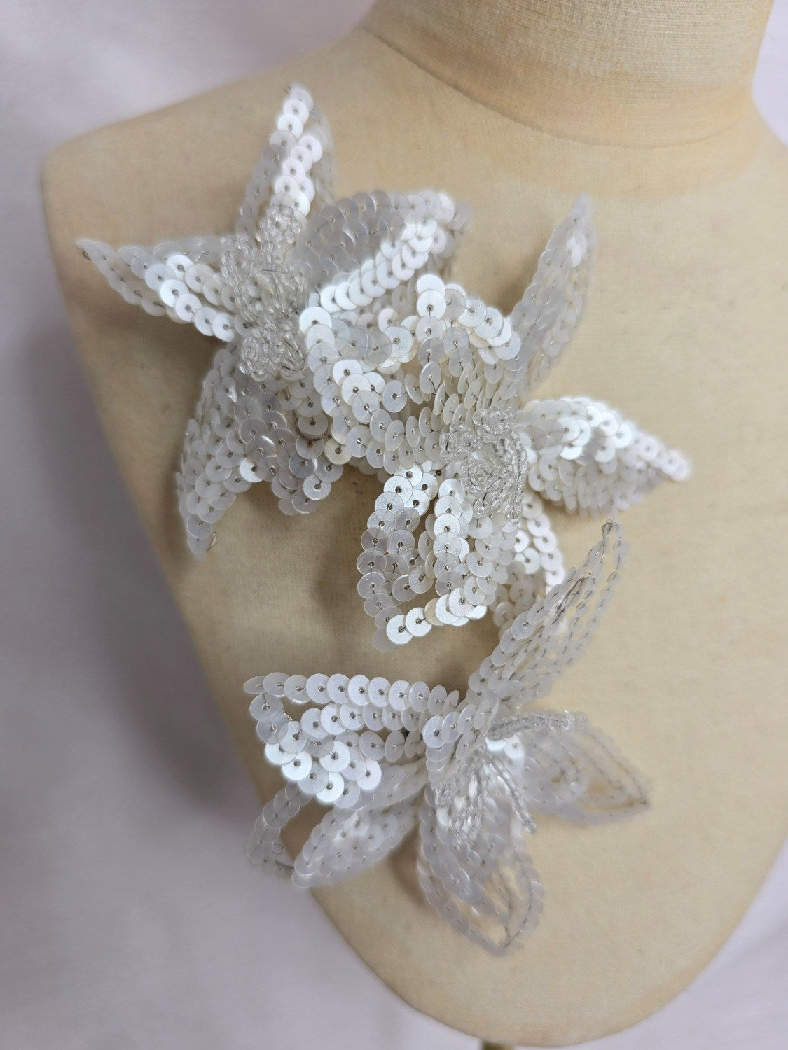 Small white sequin flower brooch