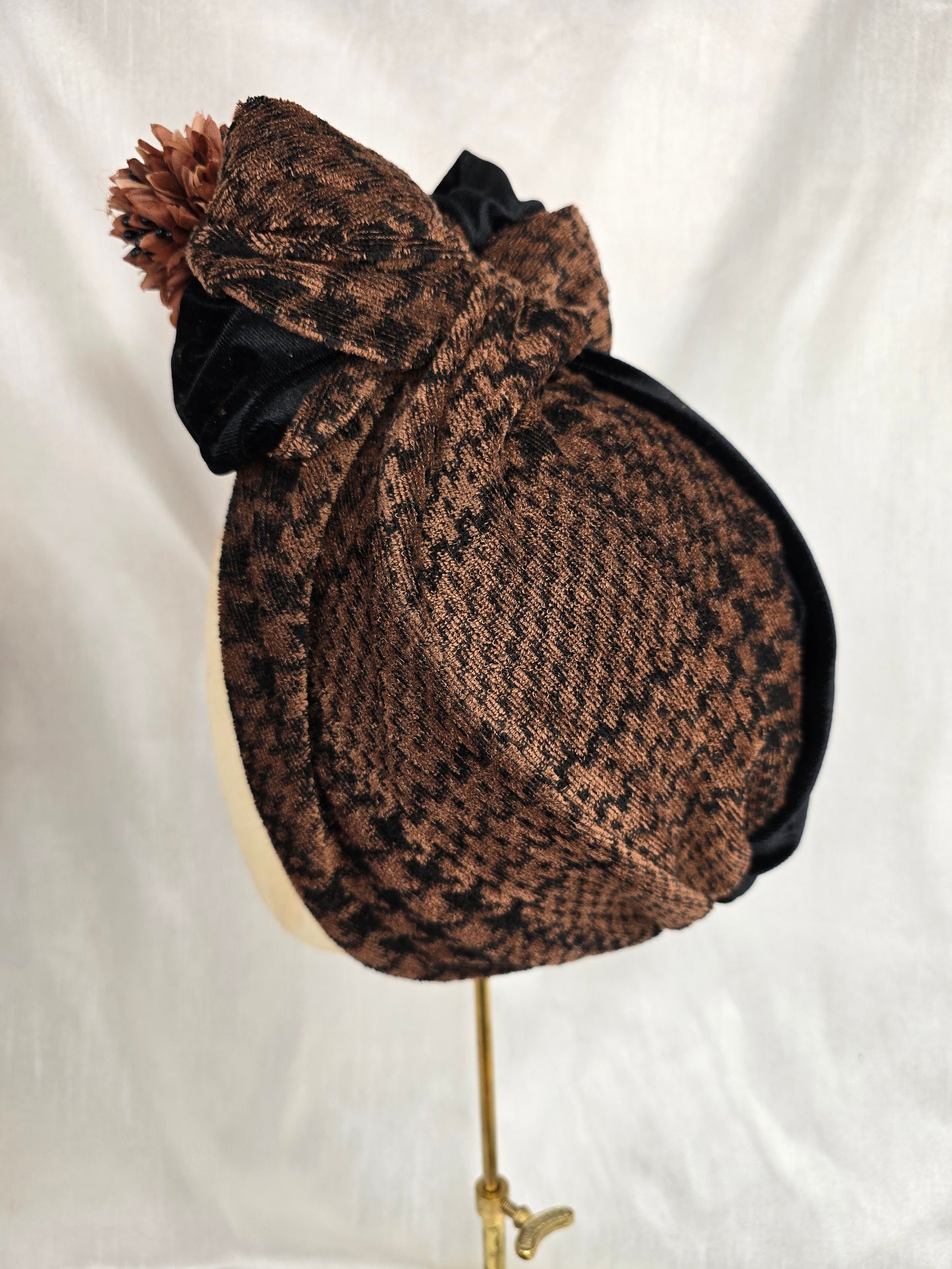 Brown houndstooth and black stretch velvet turban with brown flowers
