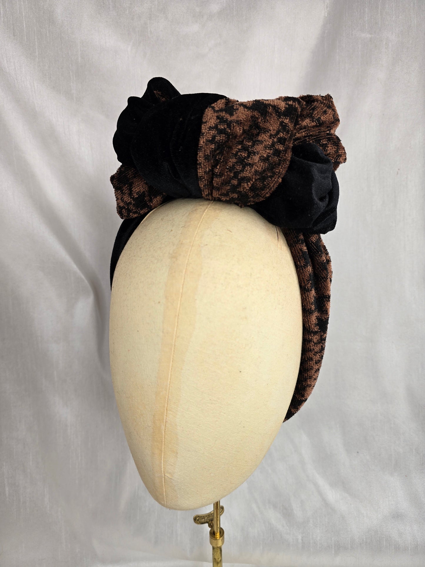 Brown houndstooth and black stretch velvet turban with brown flowers