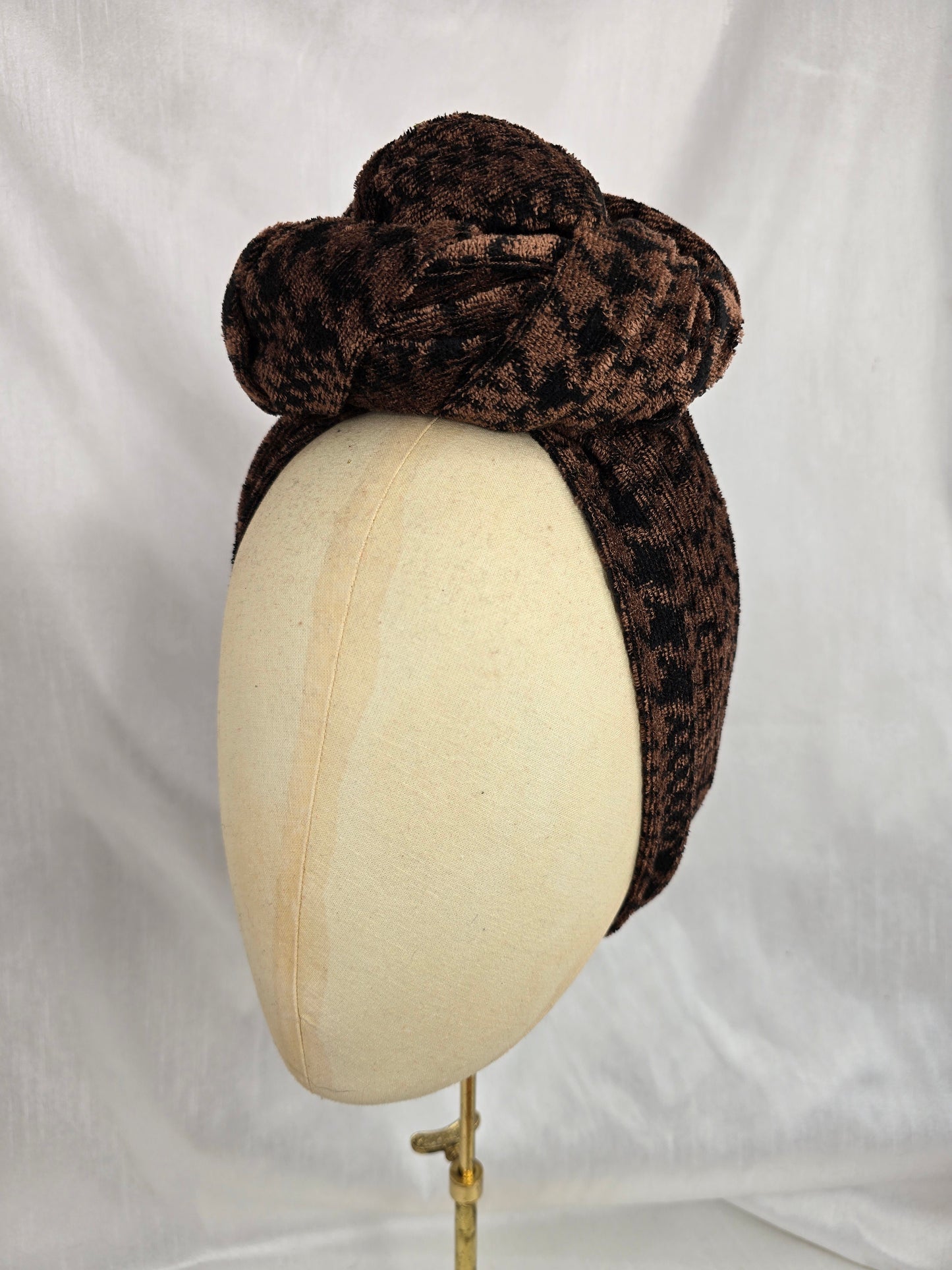 Brown houndstooth stretch velvet turban with mustard flowers
