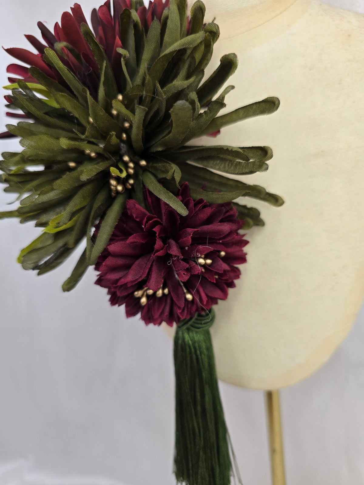 L olive, maroon and gold autumn flower headpiece/corsage with silky tassel