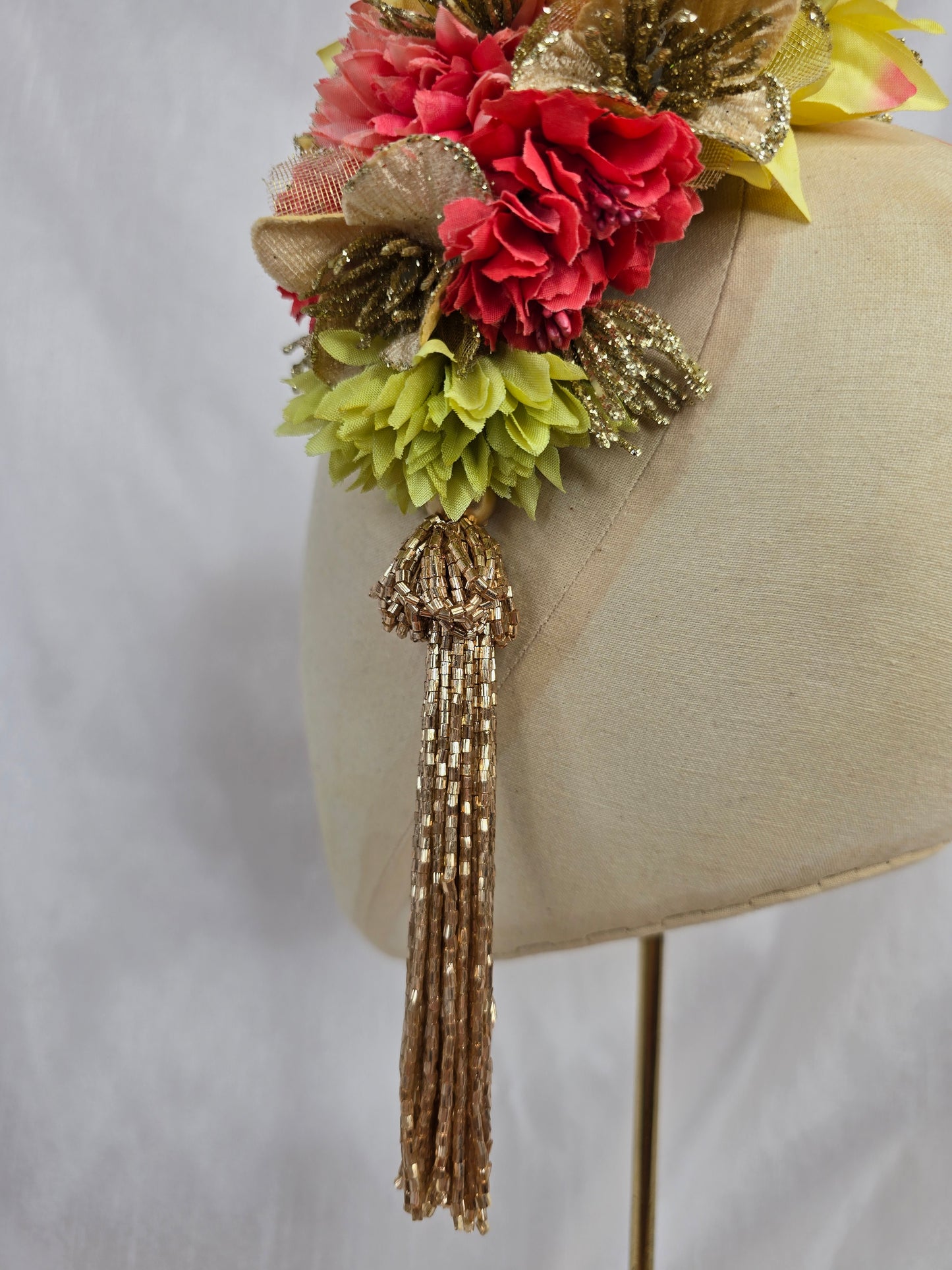 Large gold/coral/chartruese hair flower with beaded tassel