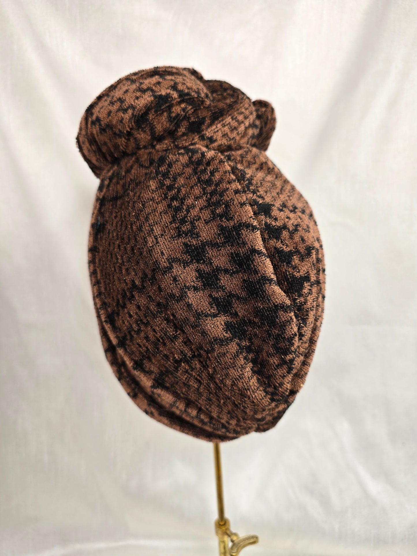 Brown houndstooth stretch velvet turban with mustard flowers