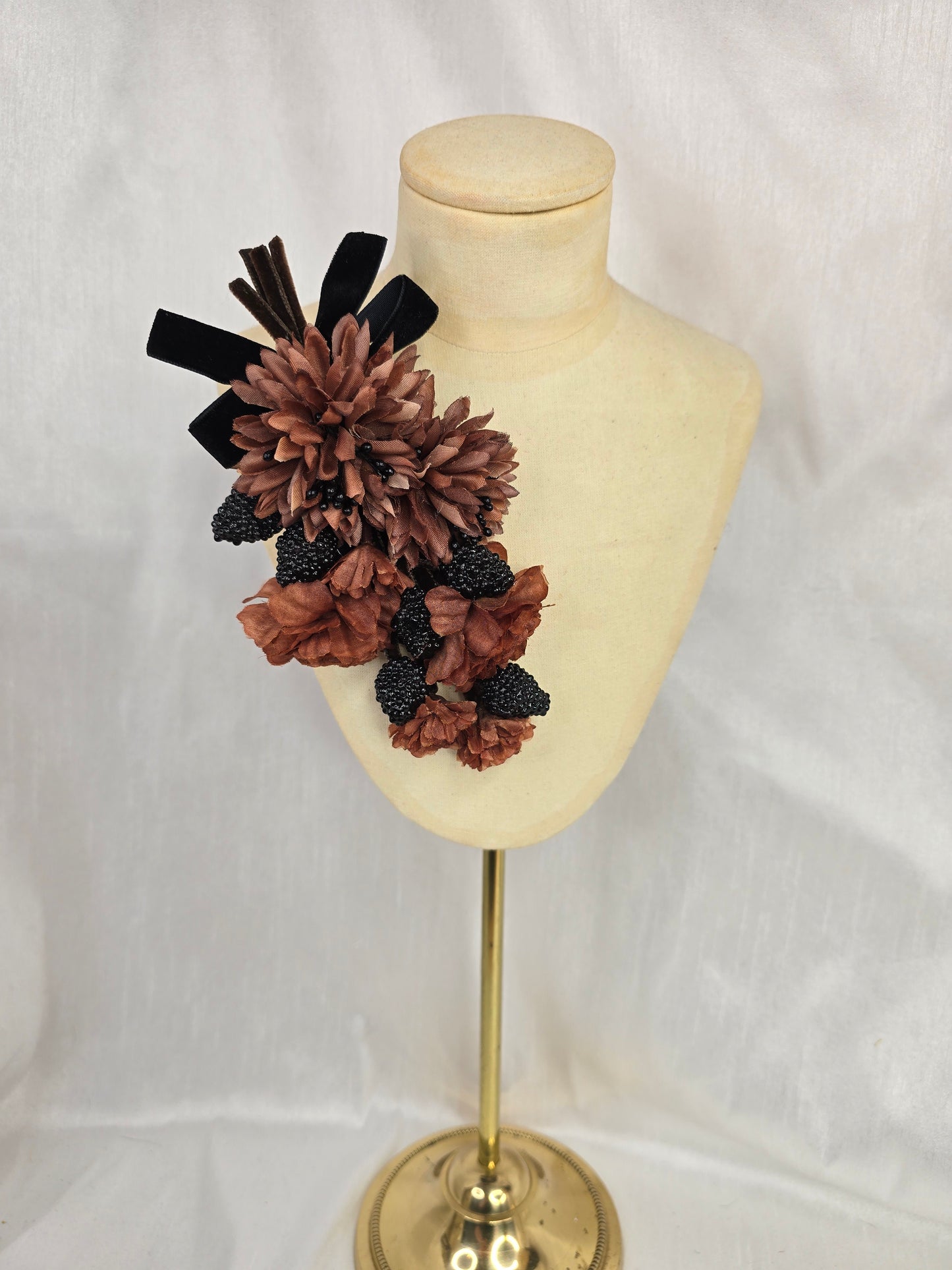 Brown houndstooth and black stretch velvet turban with brown flowers