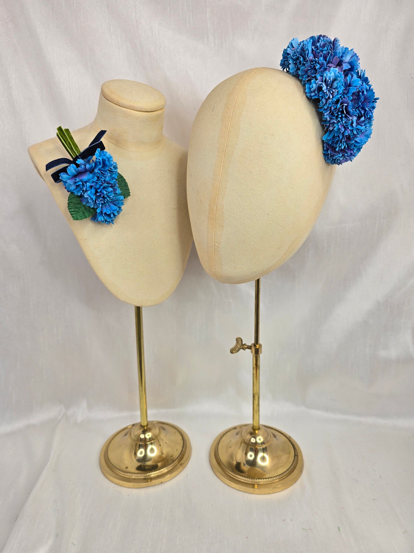 Small azure blue blossom corsage