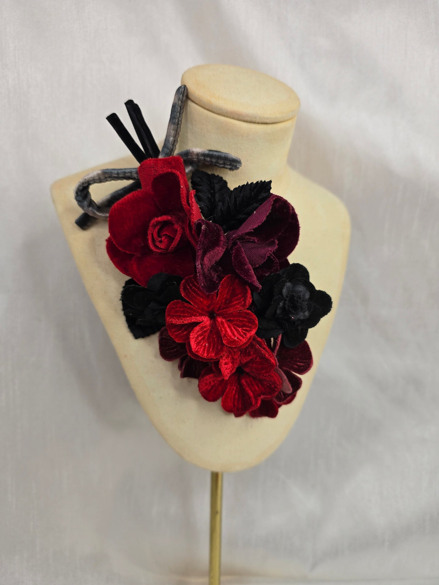 Red and leopard stretch velvet turban with corsage