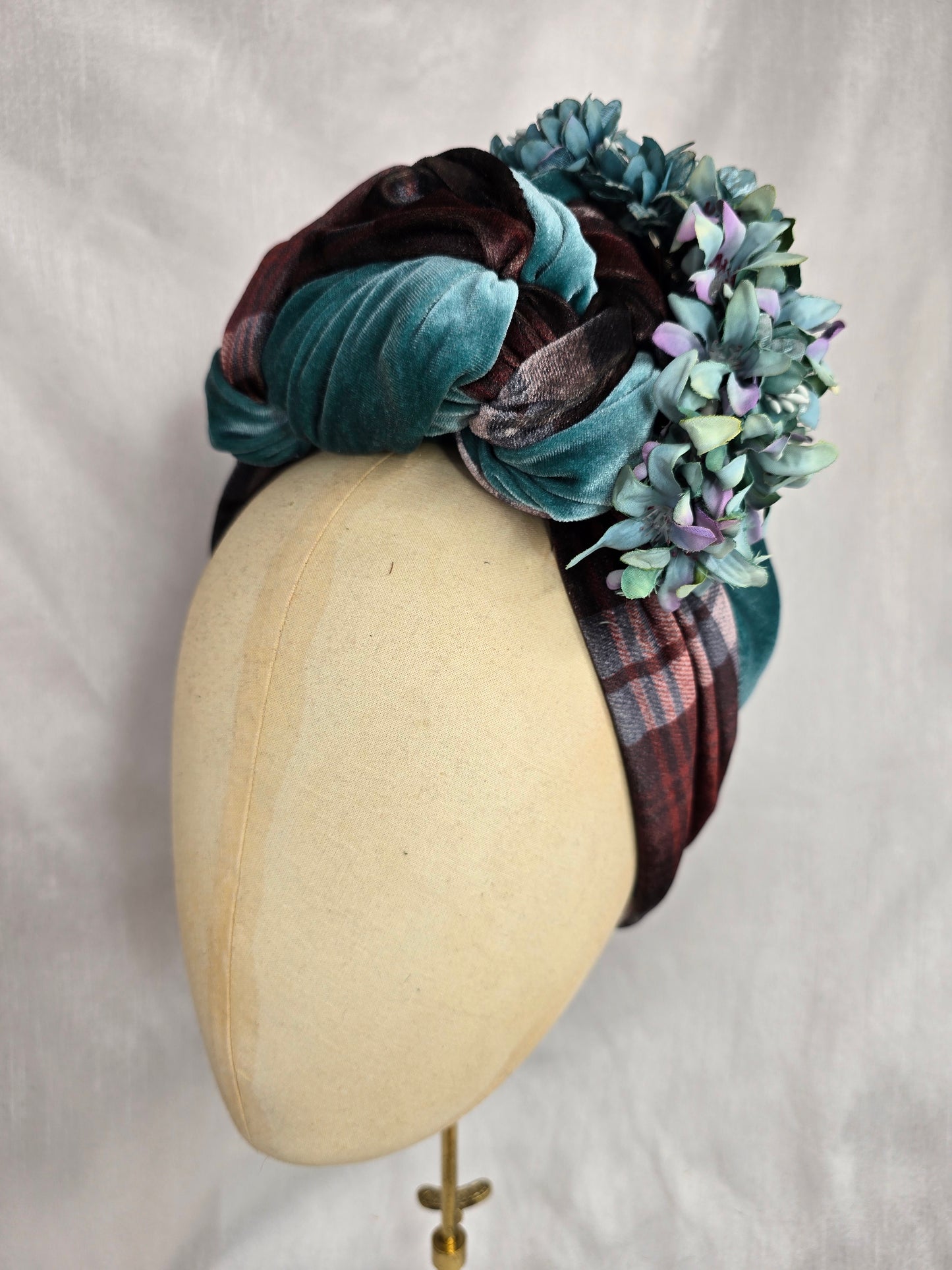 Brown check and blue stretch velvet turban with blue flowers