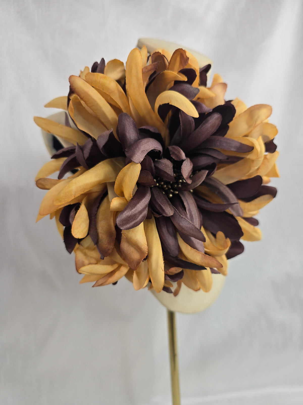 Large ochre and brown chrysanthemum corsage