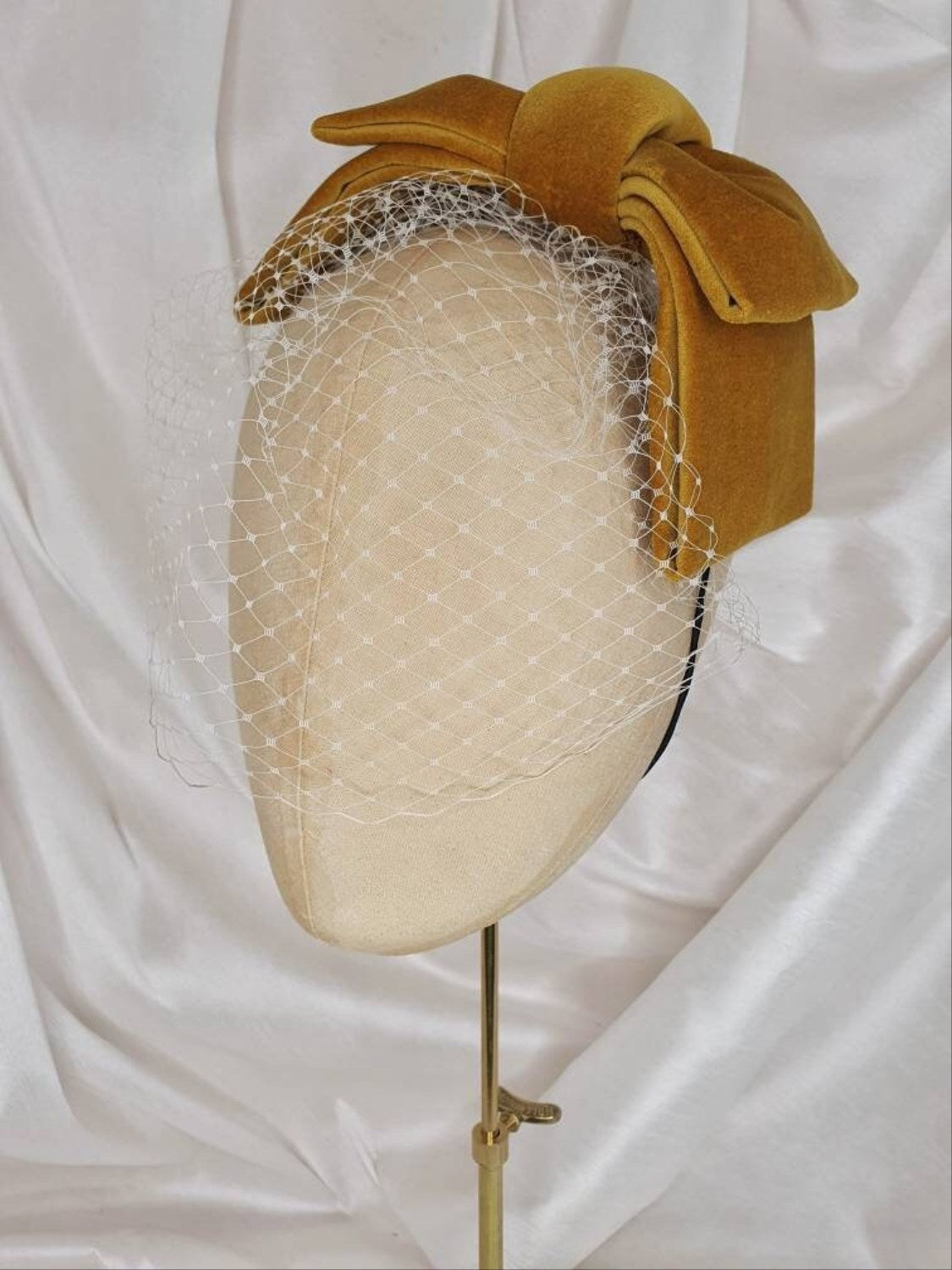 Veiled gold velvet hair bow