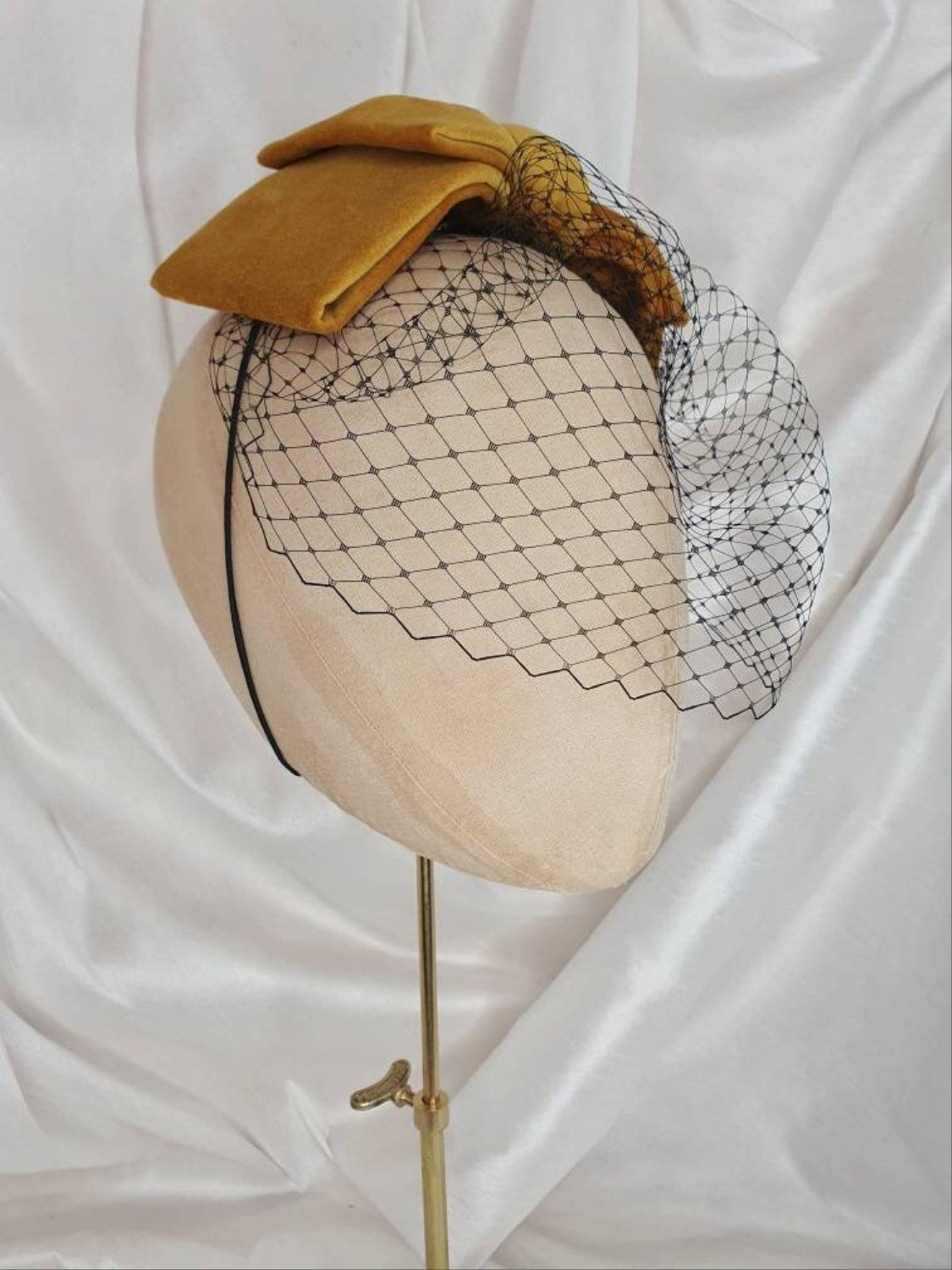 Veiled gold velvet hair bow