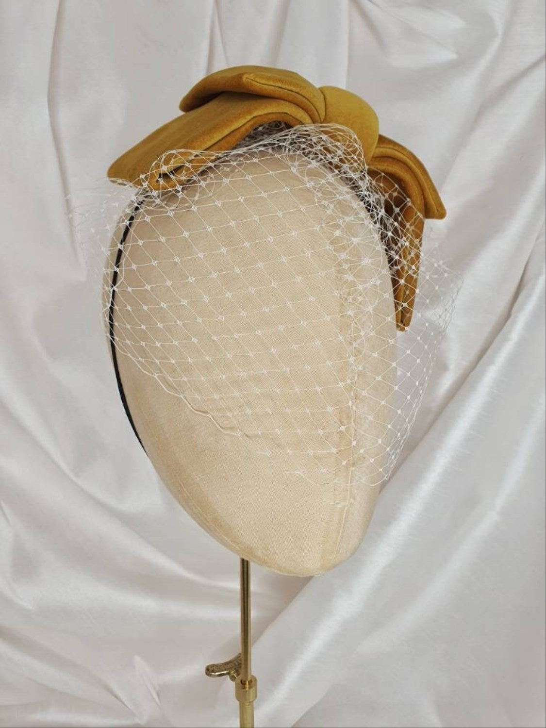Veiled gold velvet hair bow