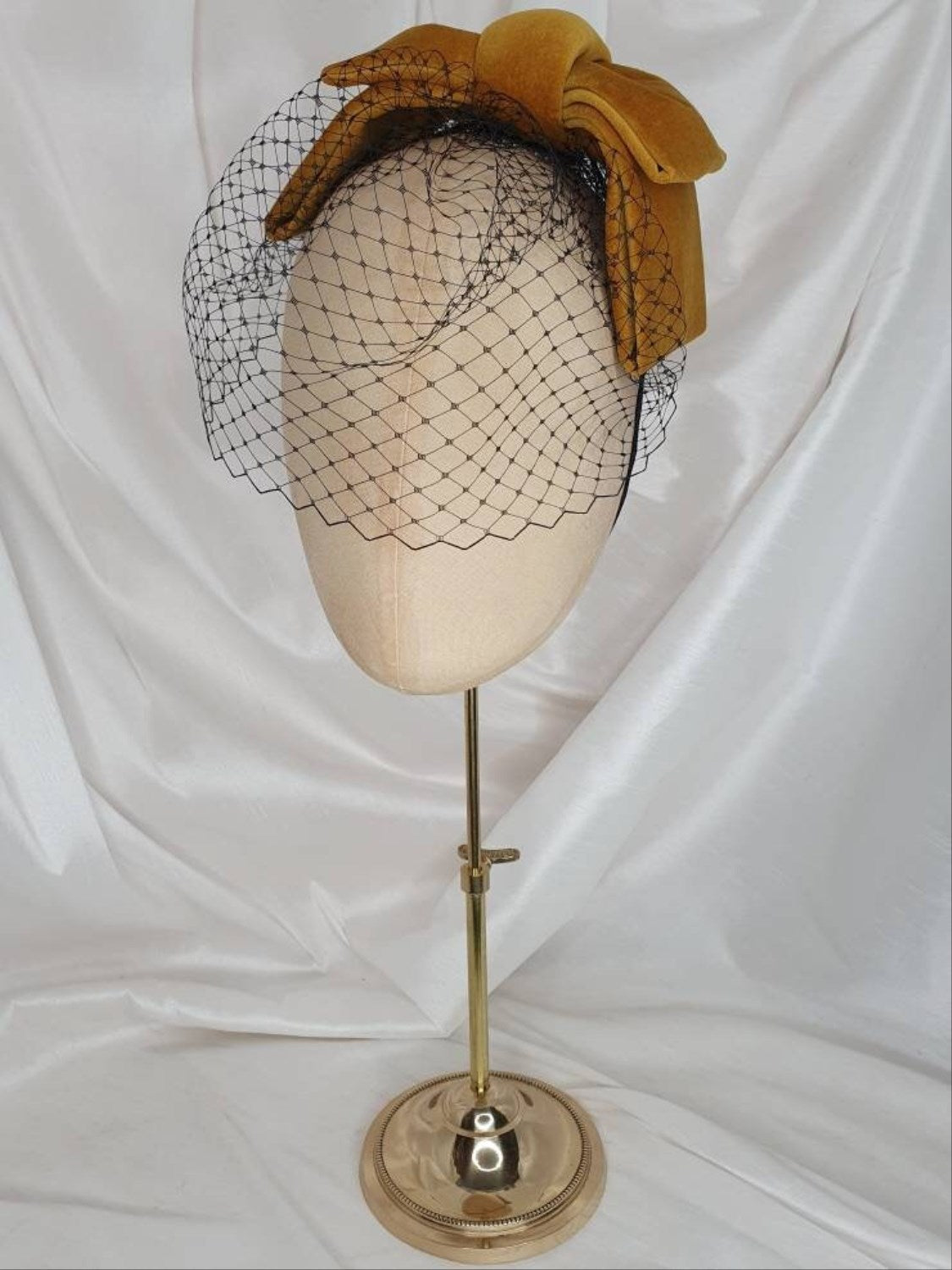 Veiled gold velvet hair bow