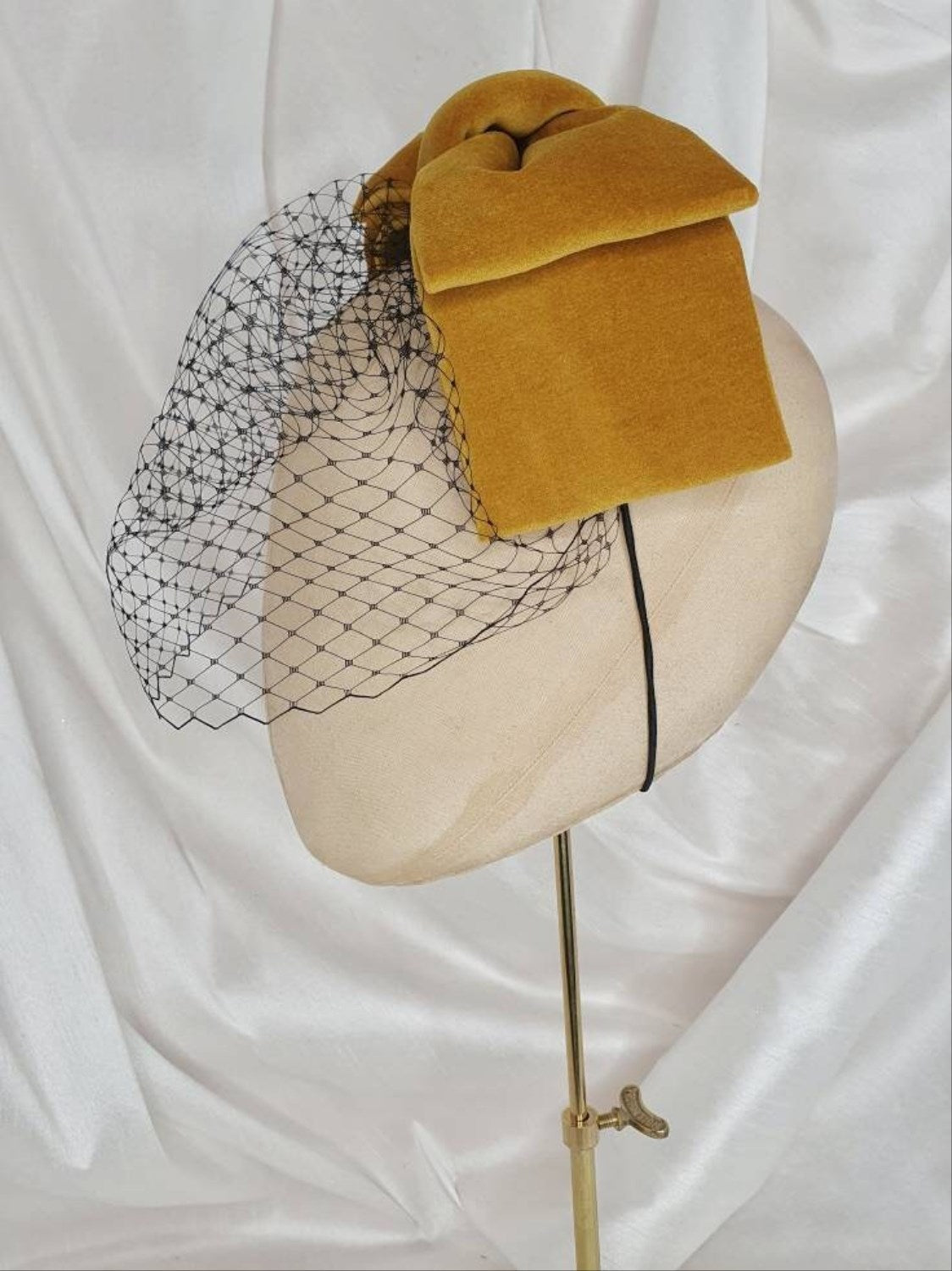 Veiled gold velvet hair bow