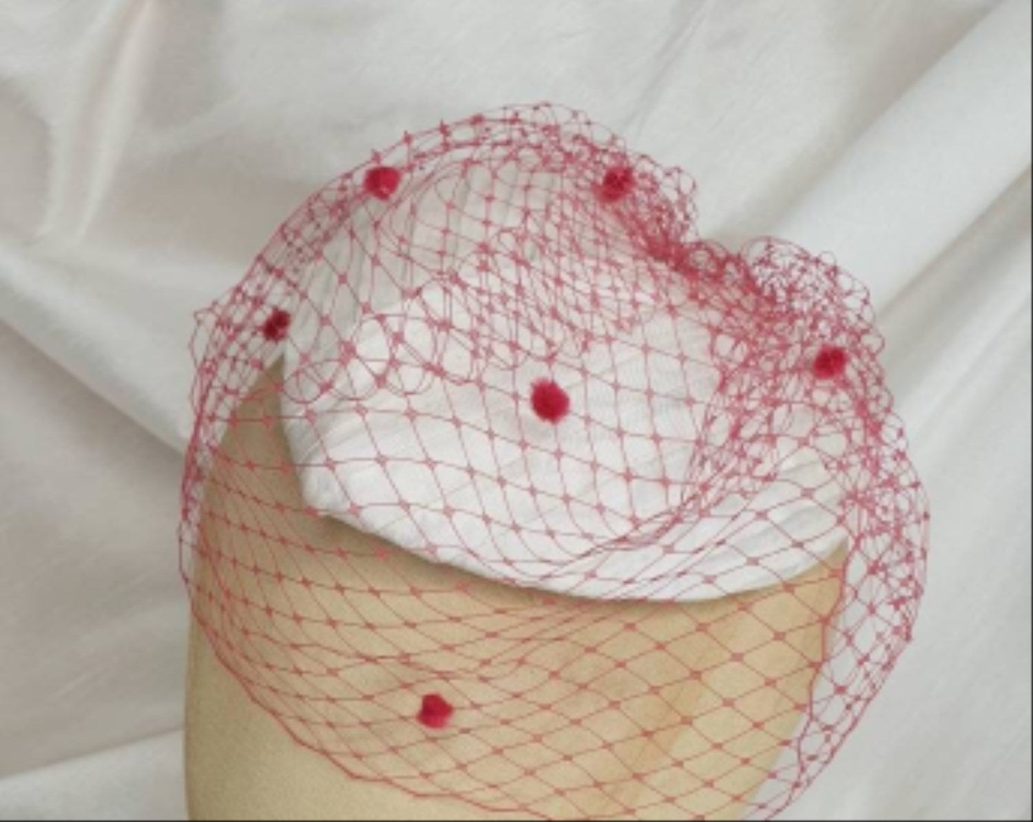White heart fascinator with veil