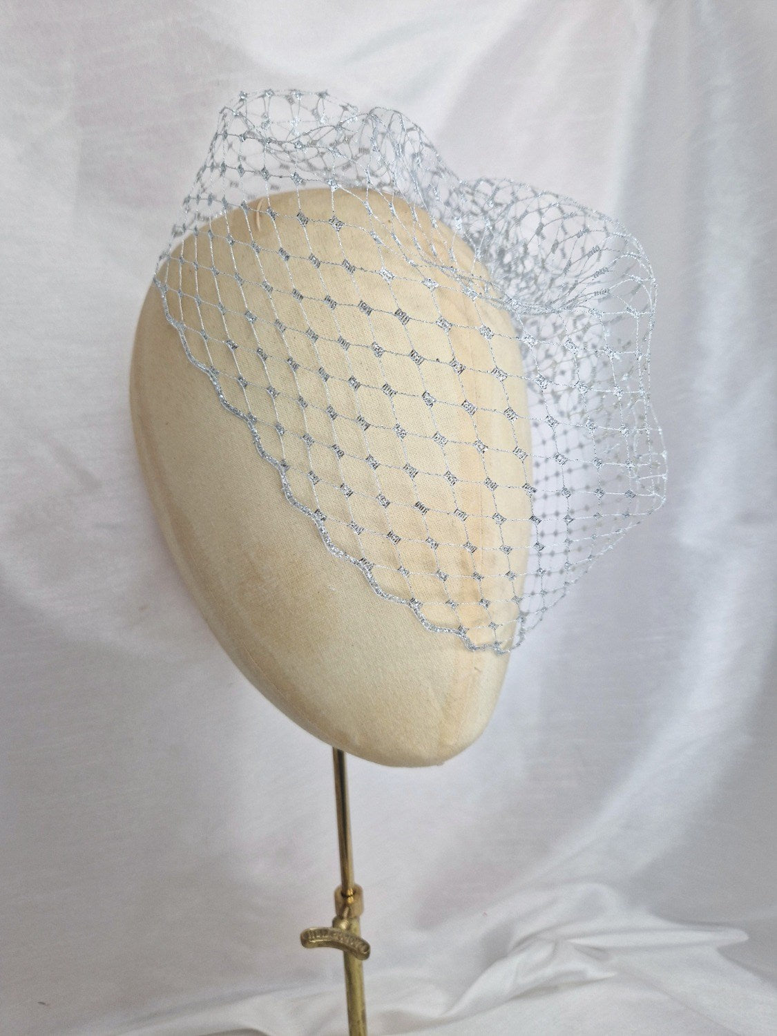 Silver metallic birdcage veil