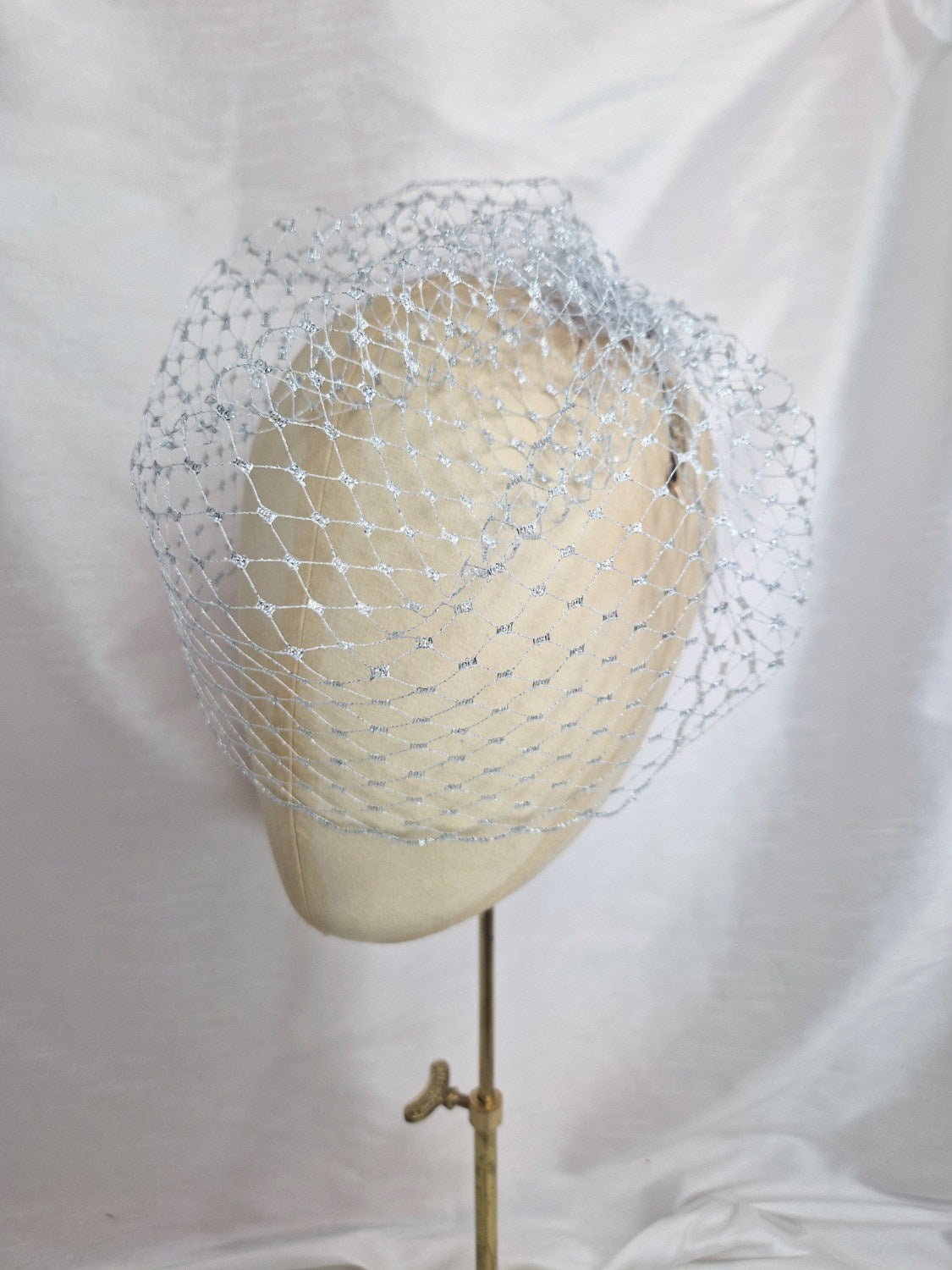 Silver metallic birdcage veil