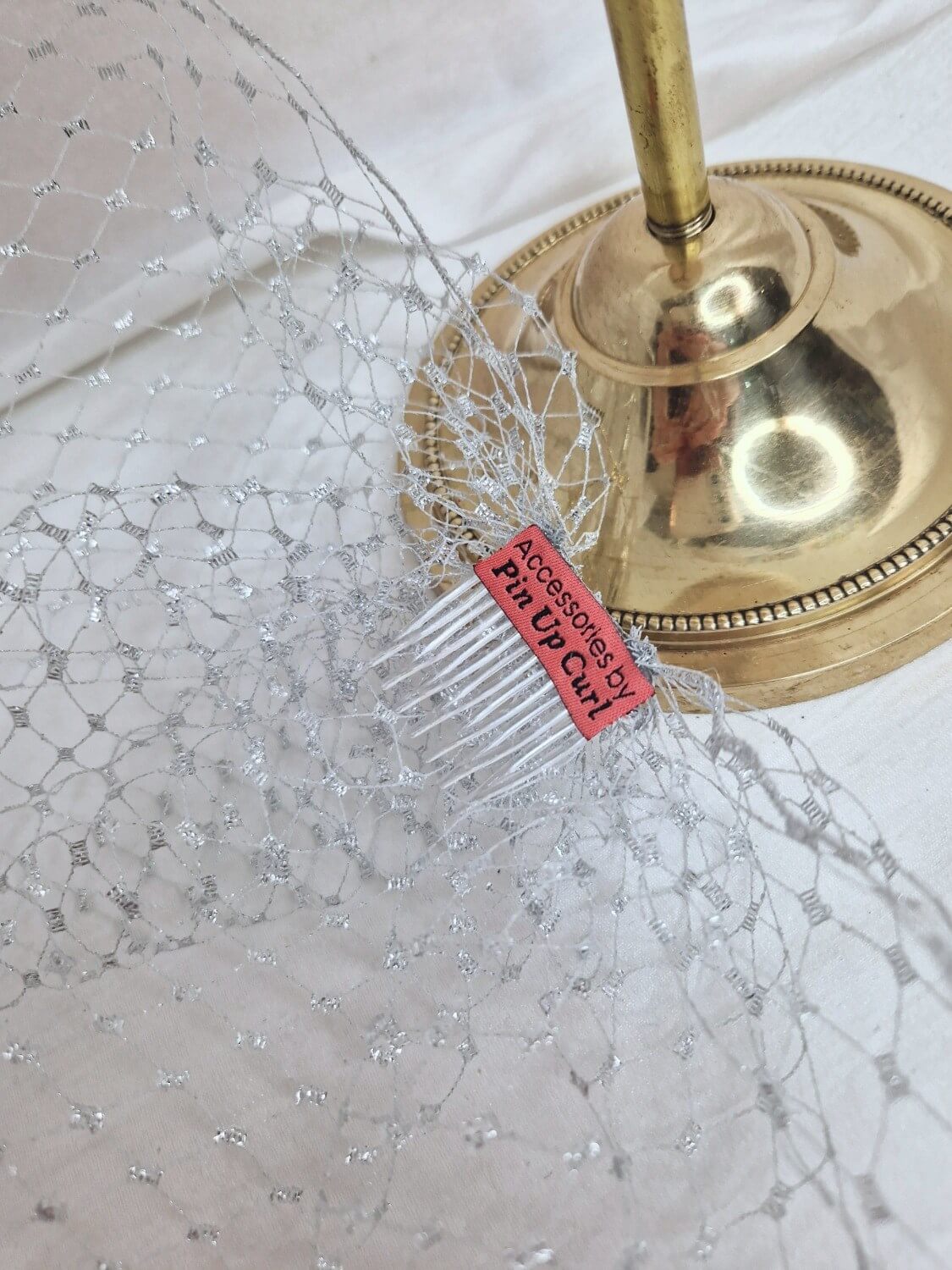 Silver metallic birdcage veil