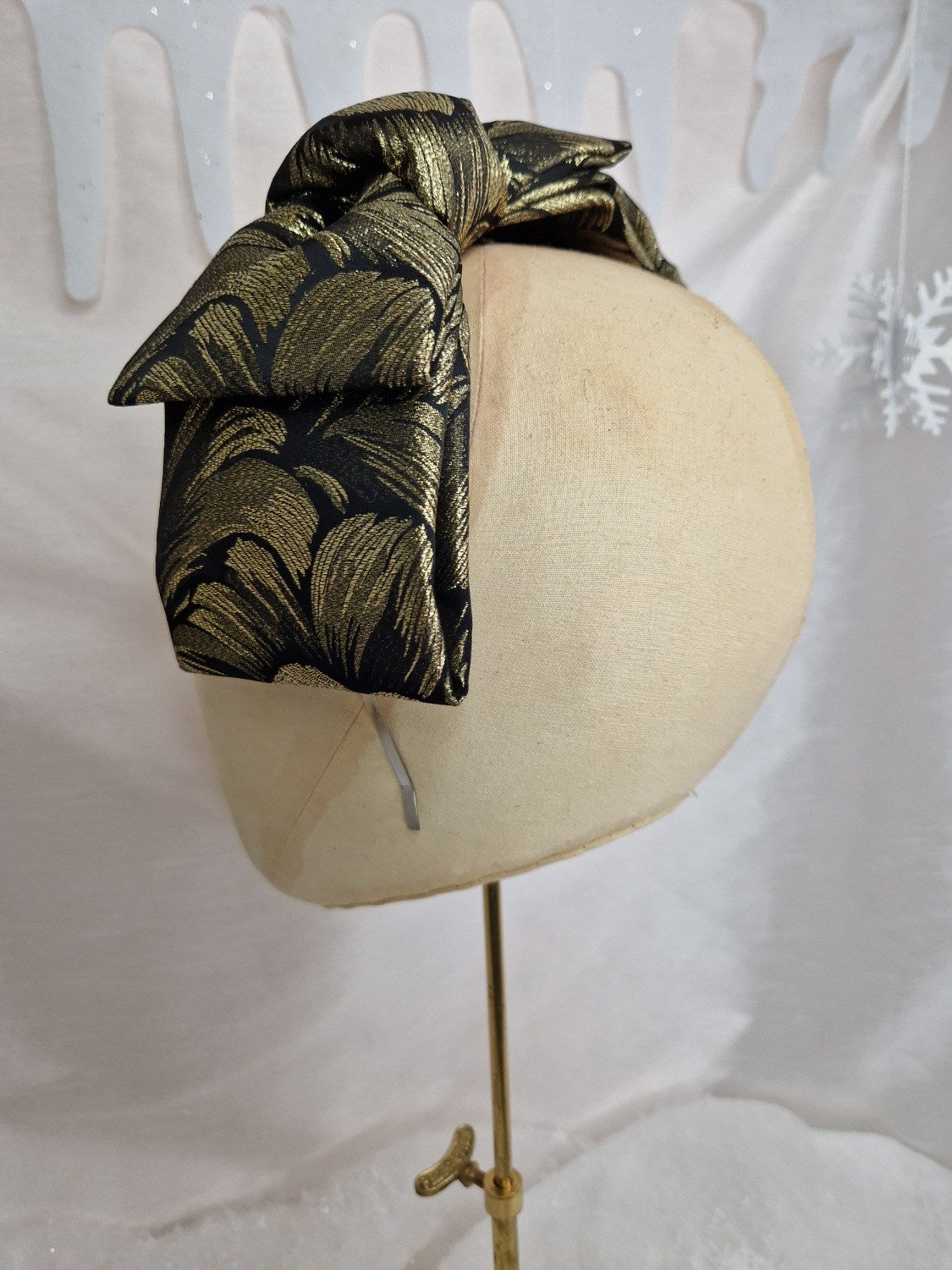 Gold and black lurex jacquard bow