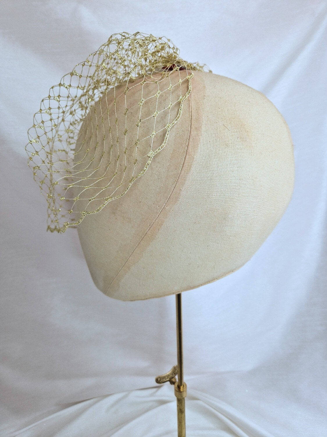 Gold metallic birdcage veil