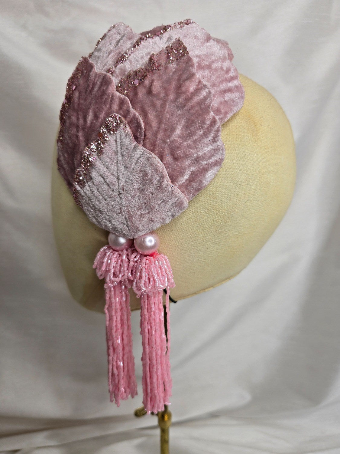 Pale pink velvet petal half hat fascinator with beaded tassels