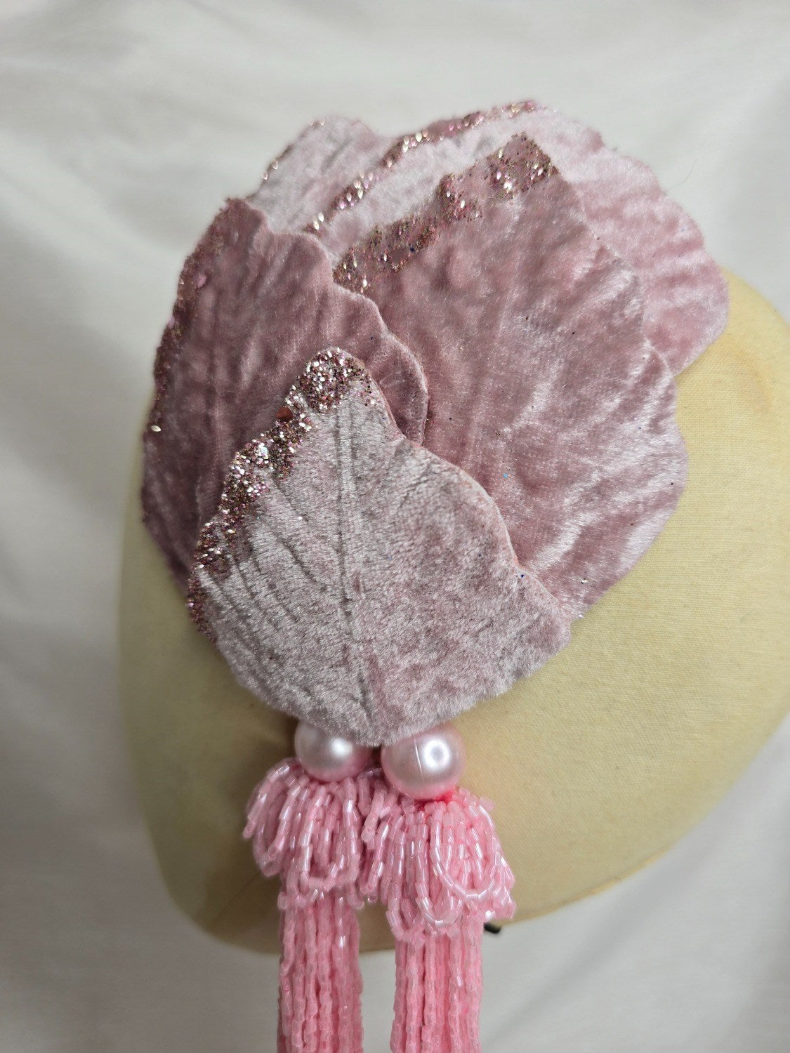 Pale pink velvet petal half hat fascinator with beaded tassels