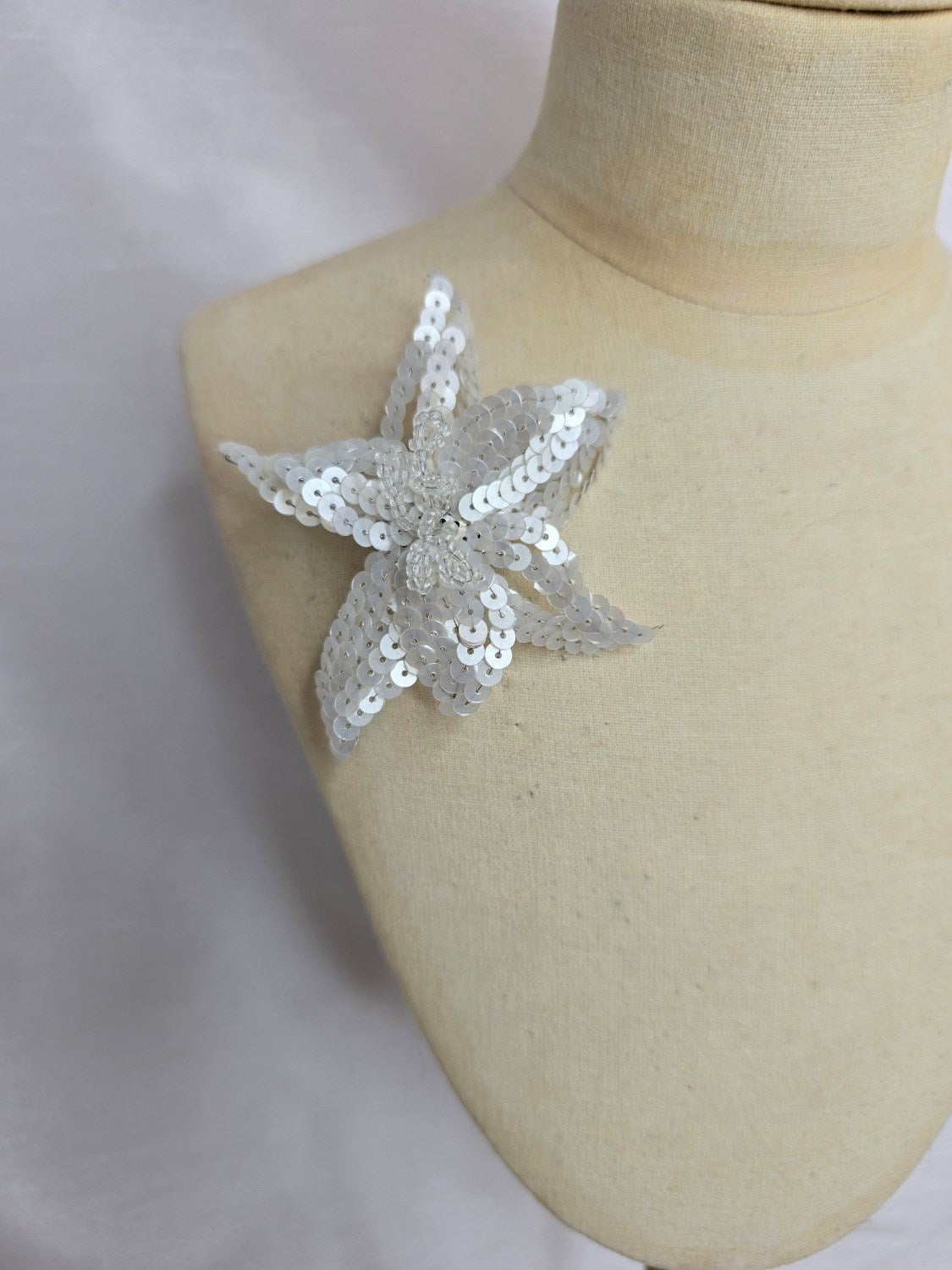 Small white sequin flower brooch