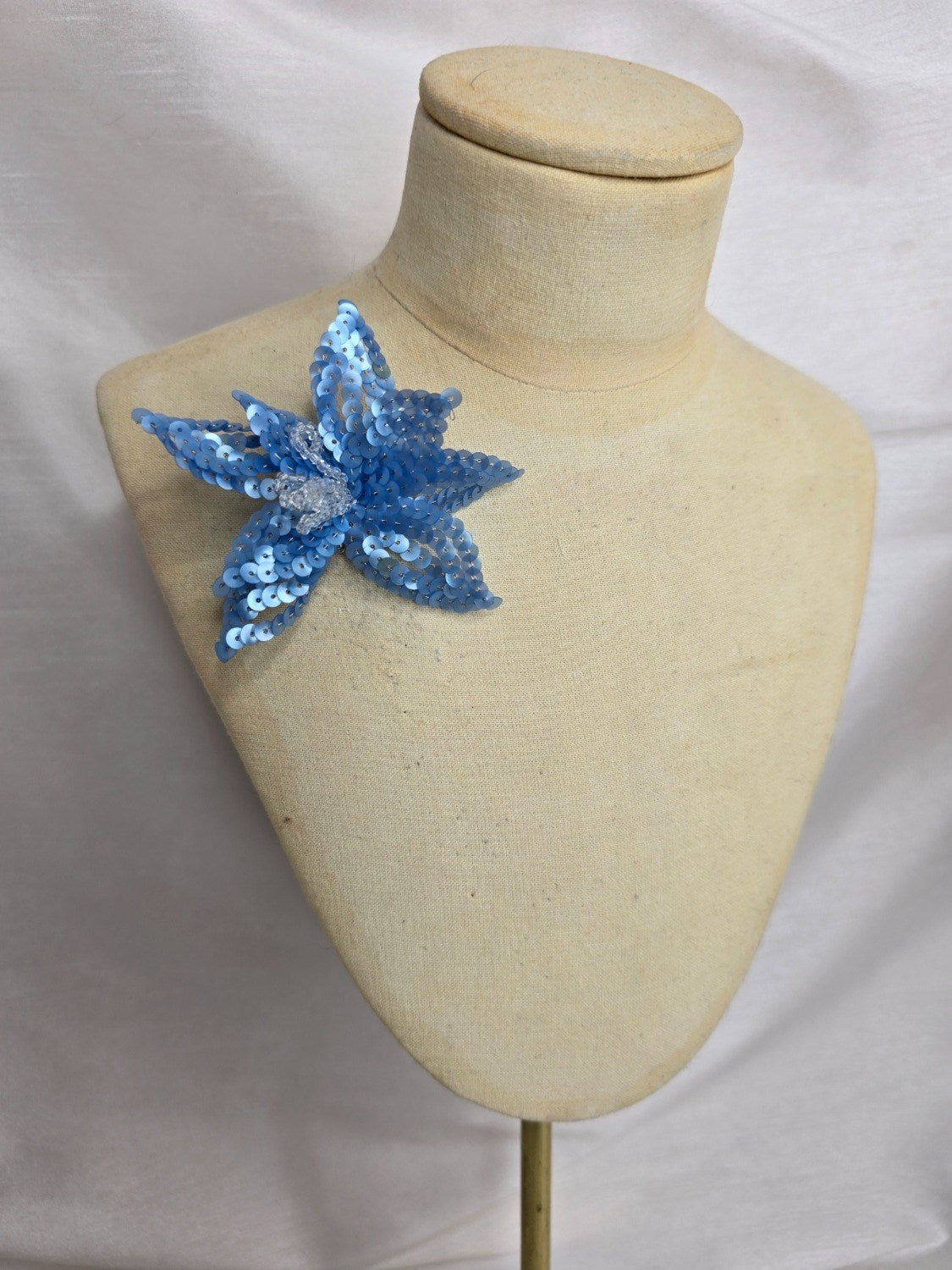 Small blue sequin flower brooch