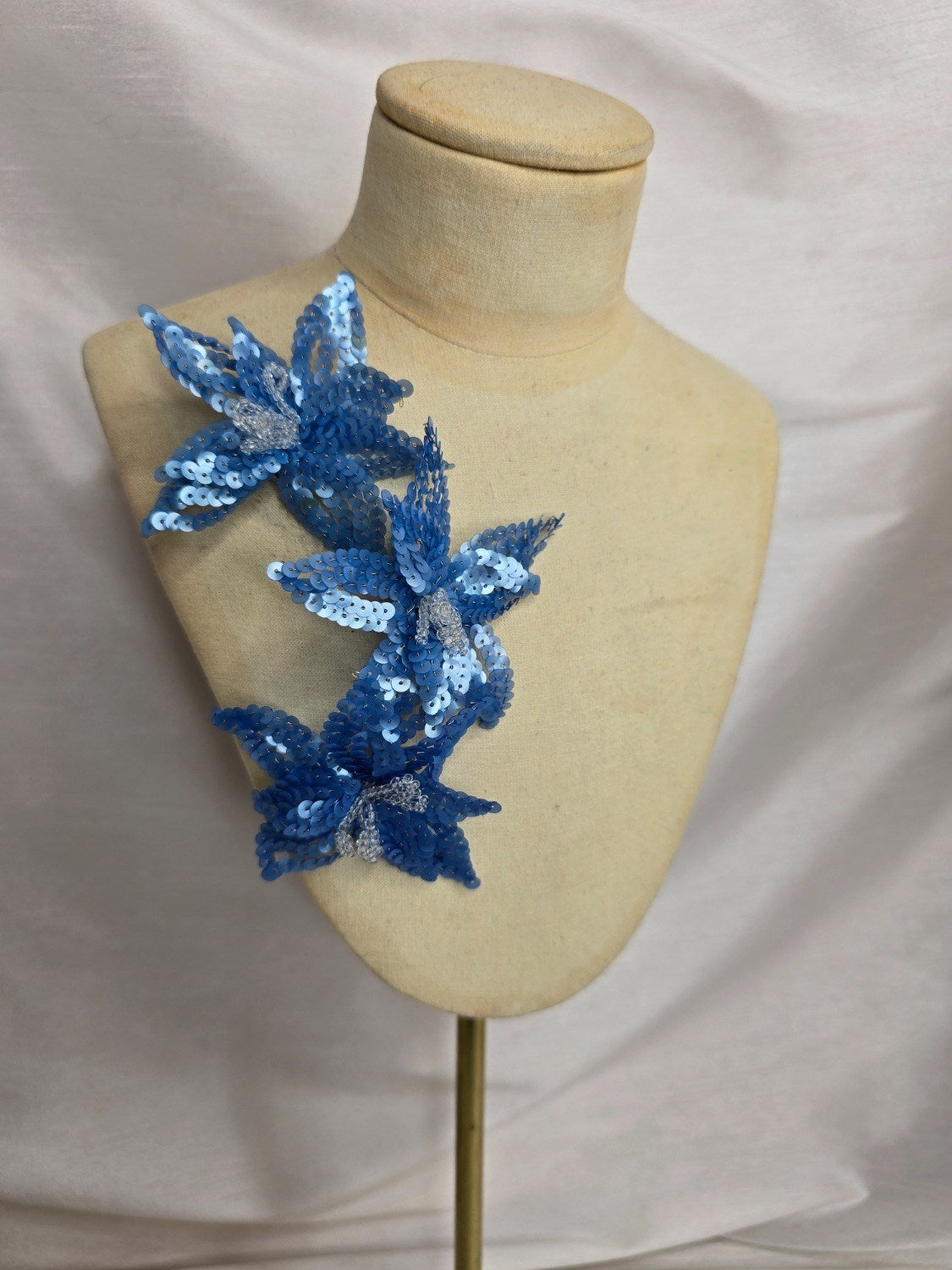 Small blue sequin flower brooch