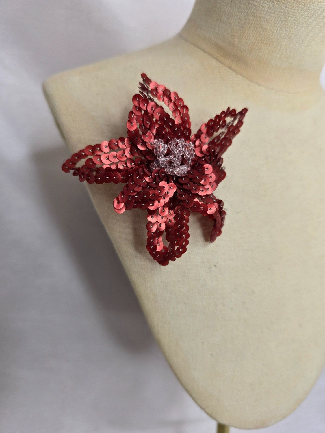 Small red sequin flower brooch