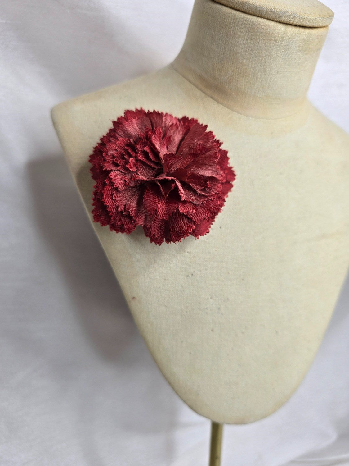 Classic mens red carnation buttonhole/bouttoniere
