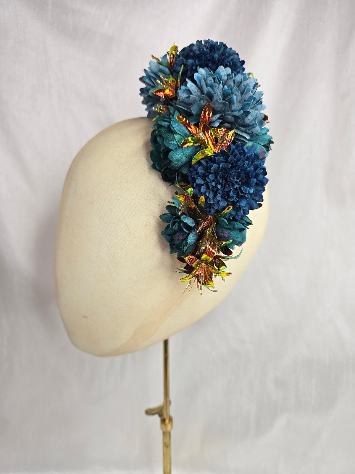 Large teal and iridescent orange large hair flower