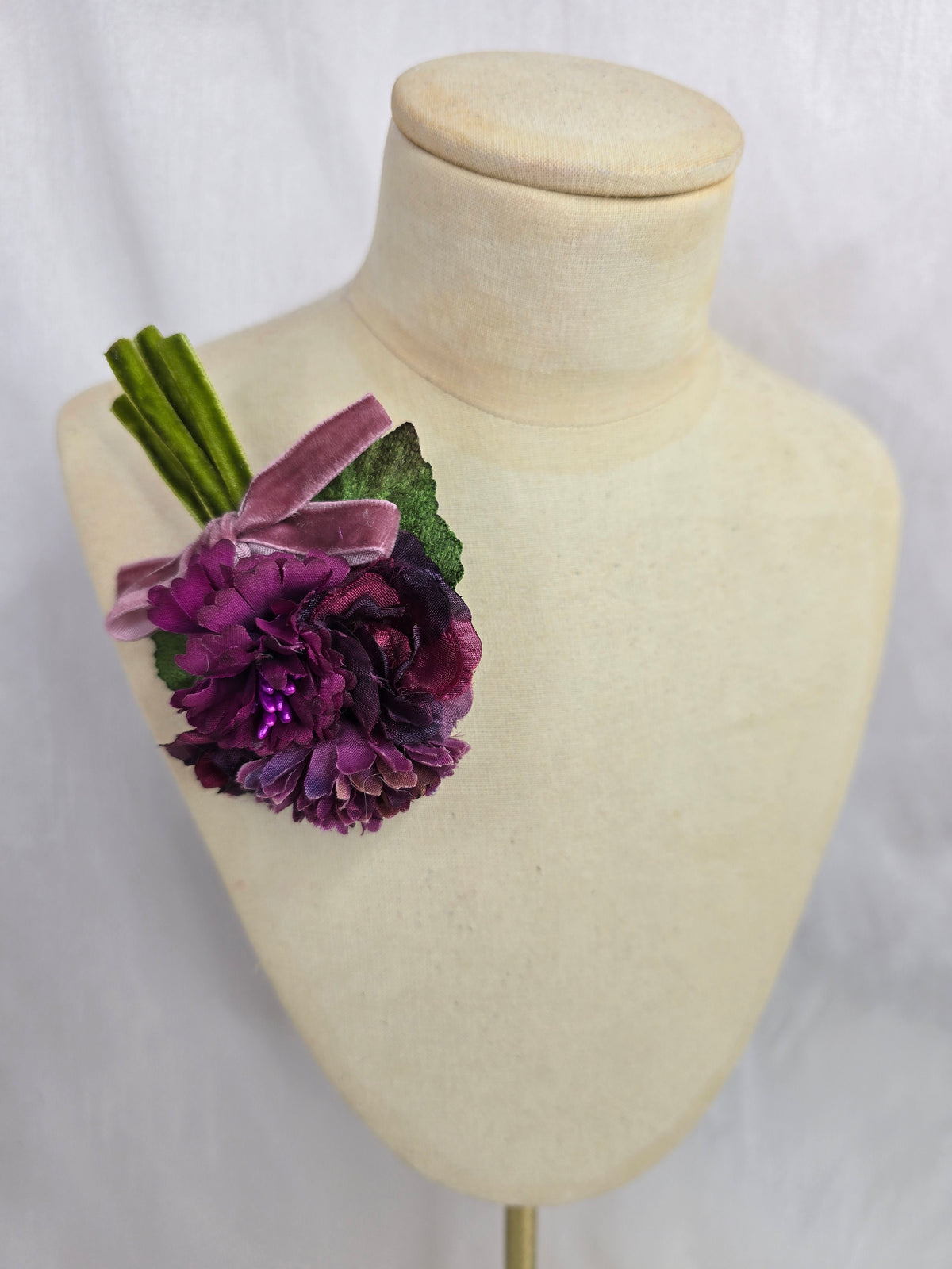 Small autumn purple blossom corsage