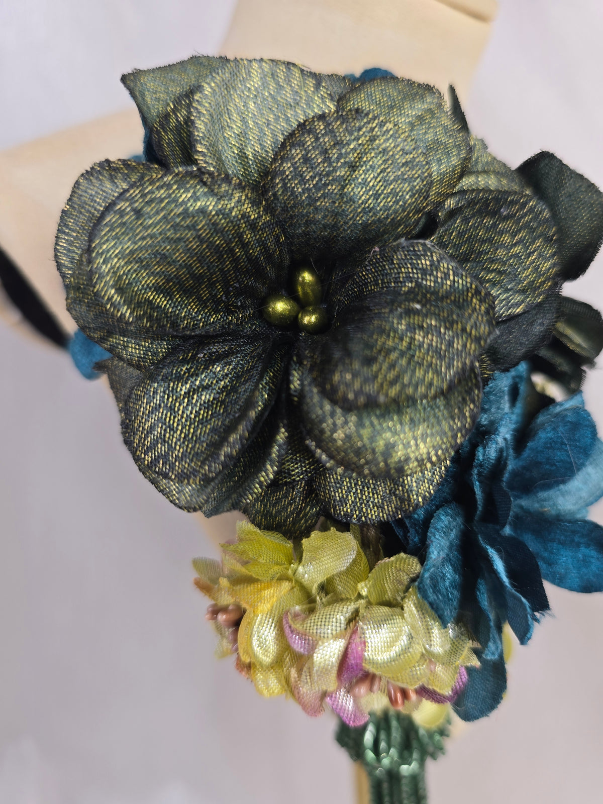 Medium teal, green, gold and chartreuse flower headpiece/corsage with beaded tassel