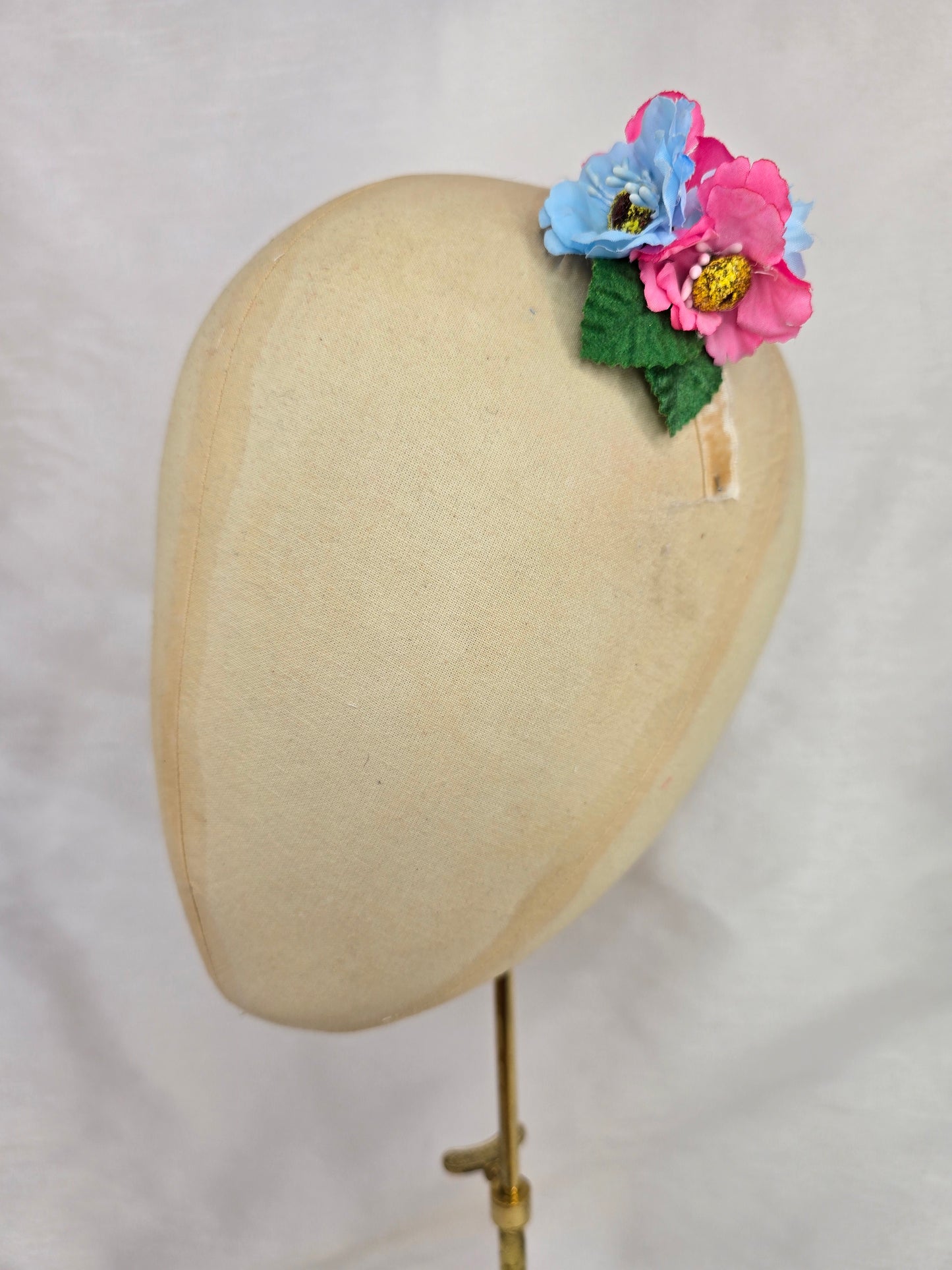 Pink and blue small hair flower