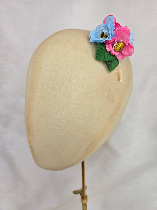 Pink and blue small hair flower