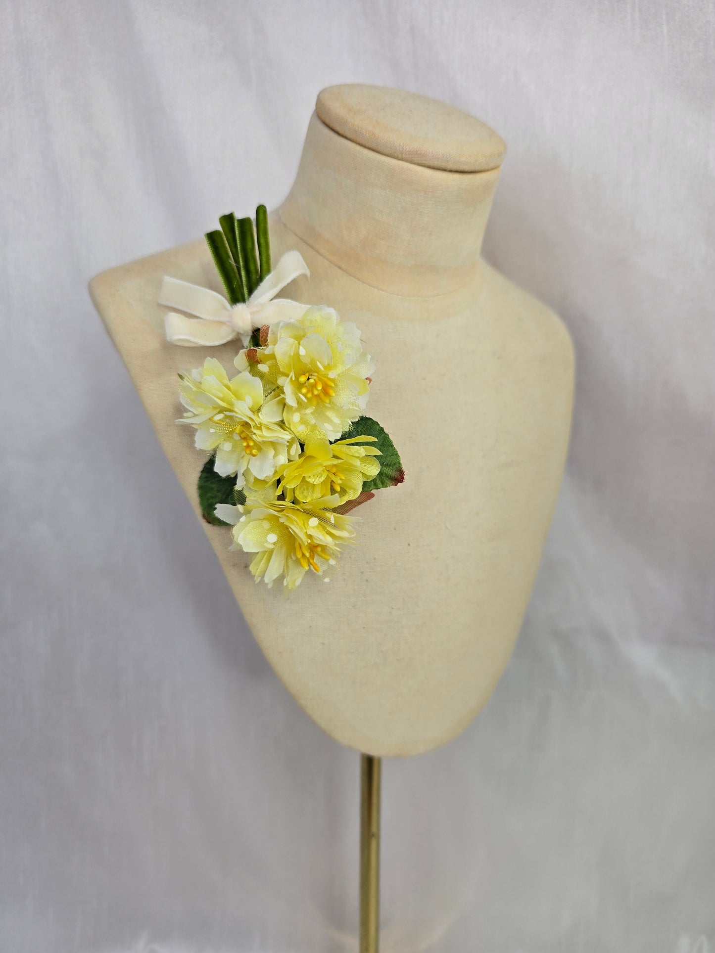 Small yellow blossom corsage