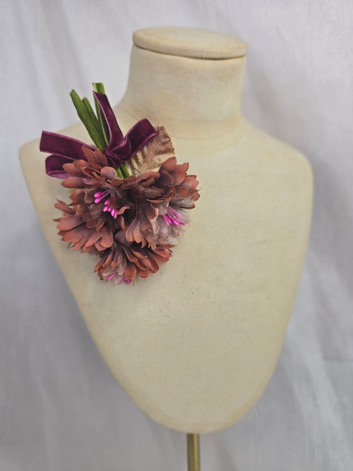 Small burnt peach blossom corsage