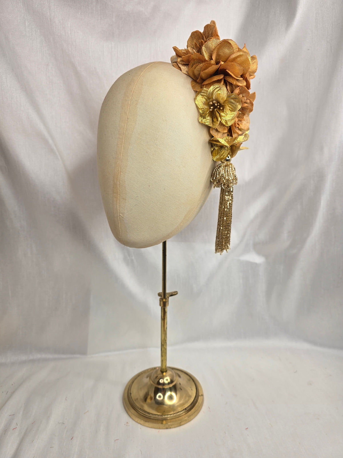 Medium autumn gold flower headpiece/corsage with beaded tassel