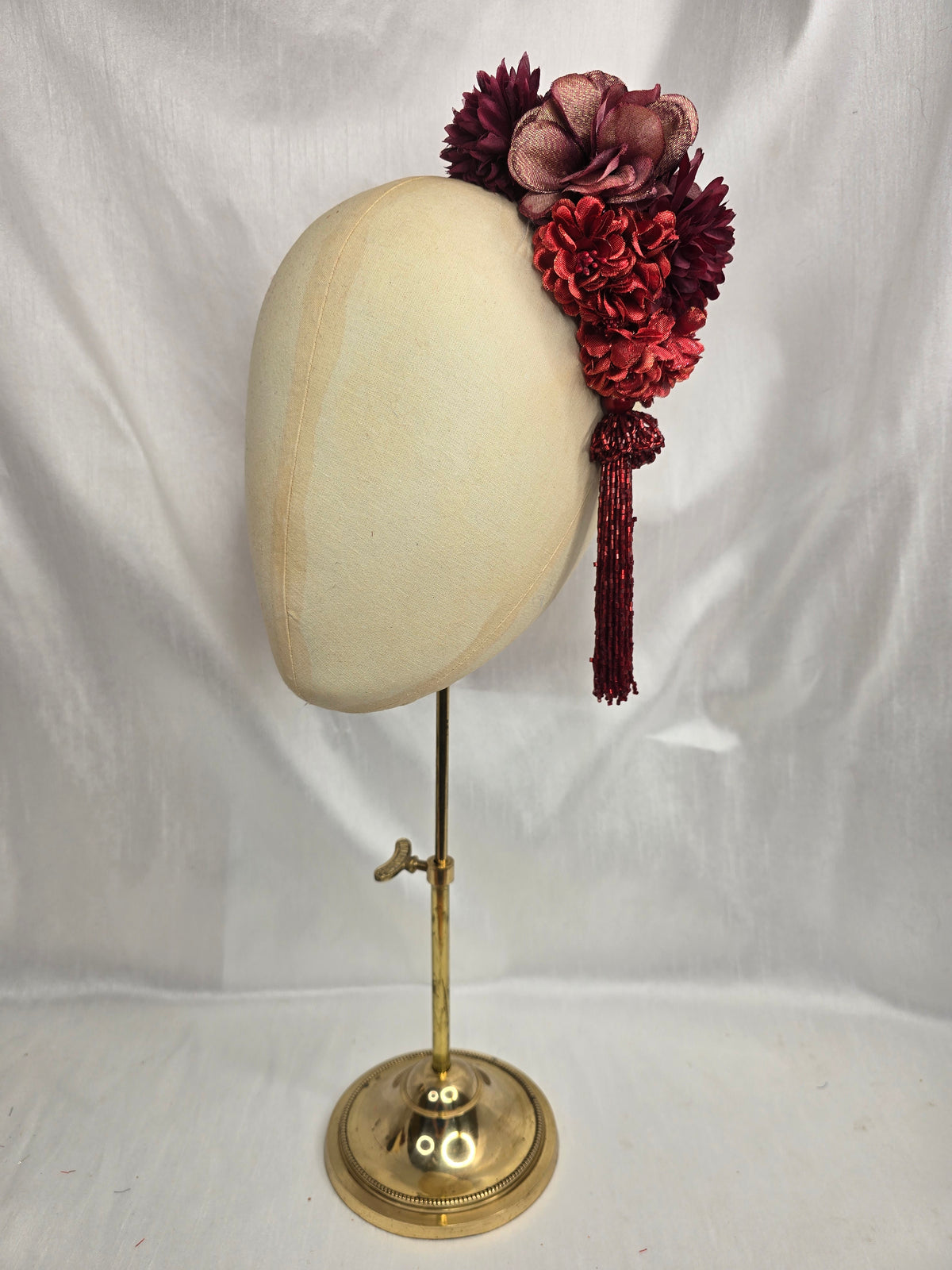 Medium autumn red flower headpiece/corsage with beaded tassel