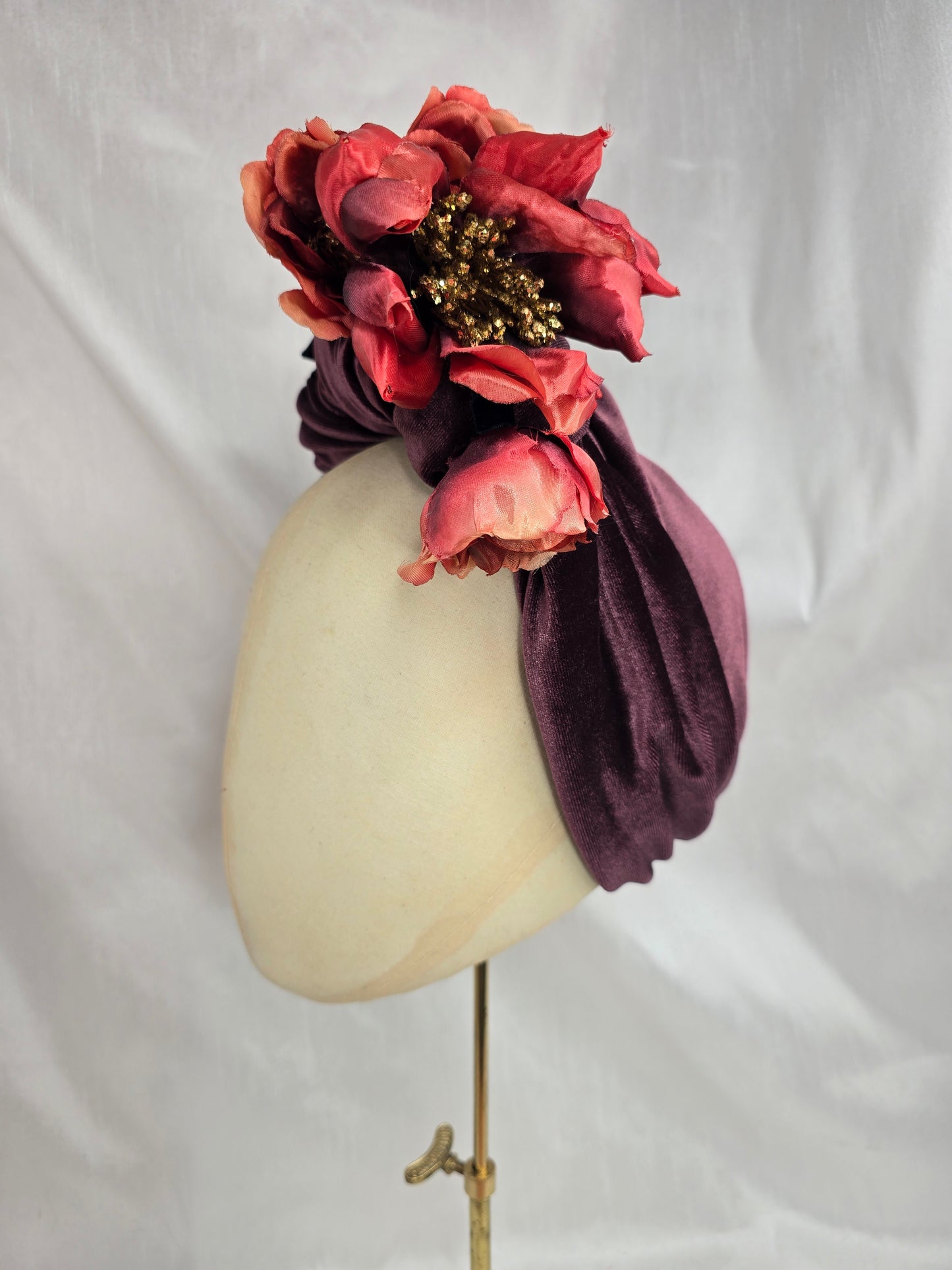 Plum brown stretch velvet turban with flower trim and corsage