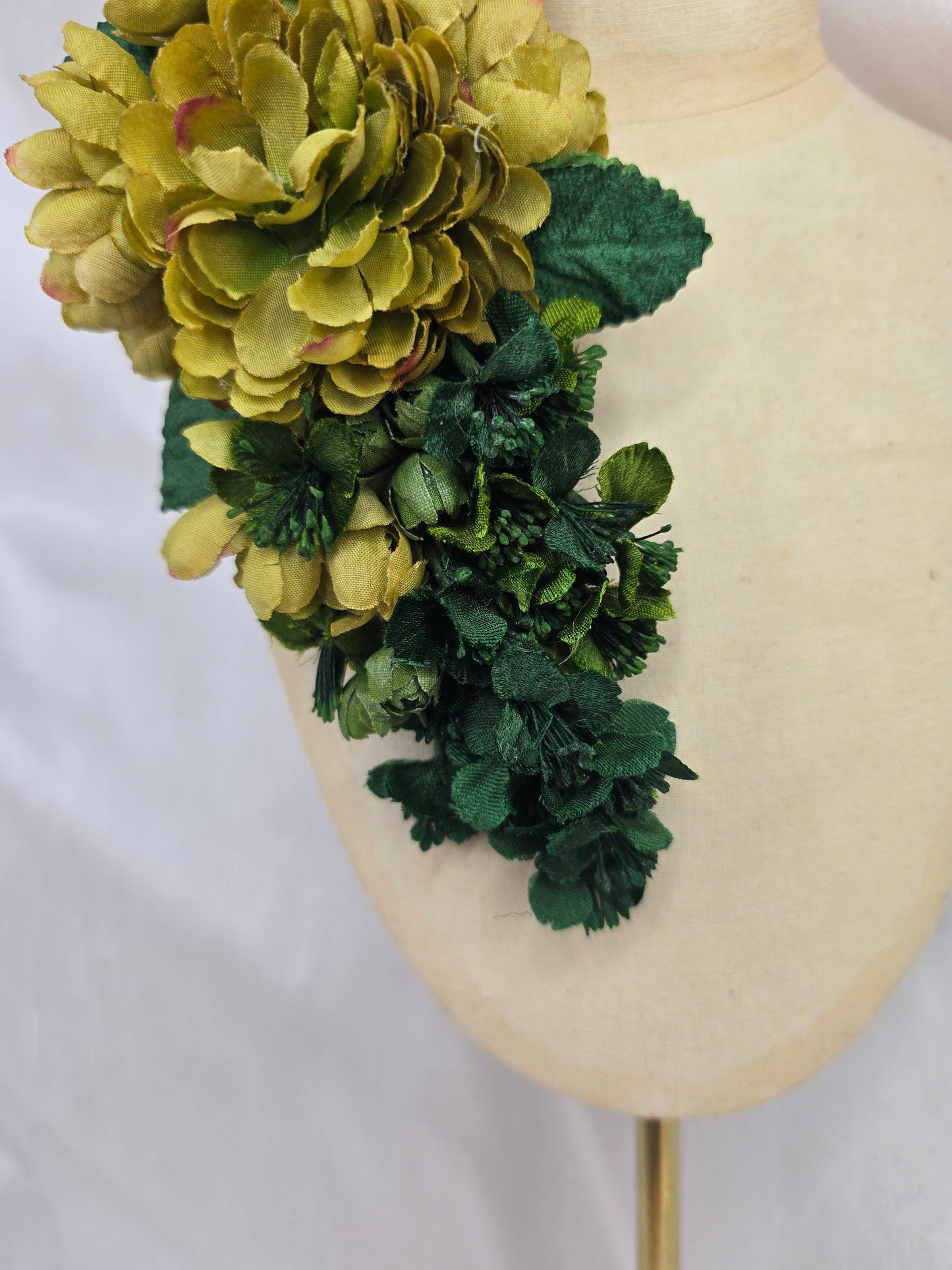 Green two tone turban with corsage