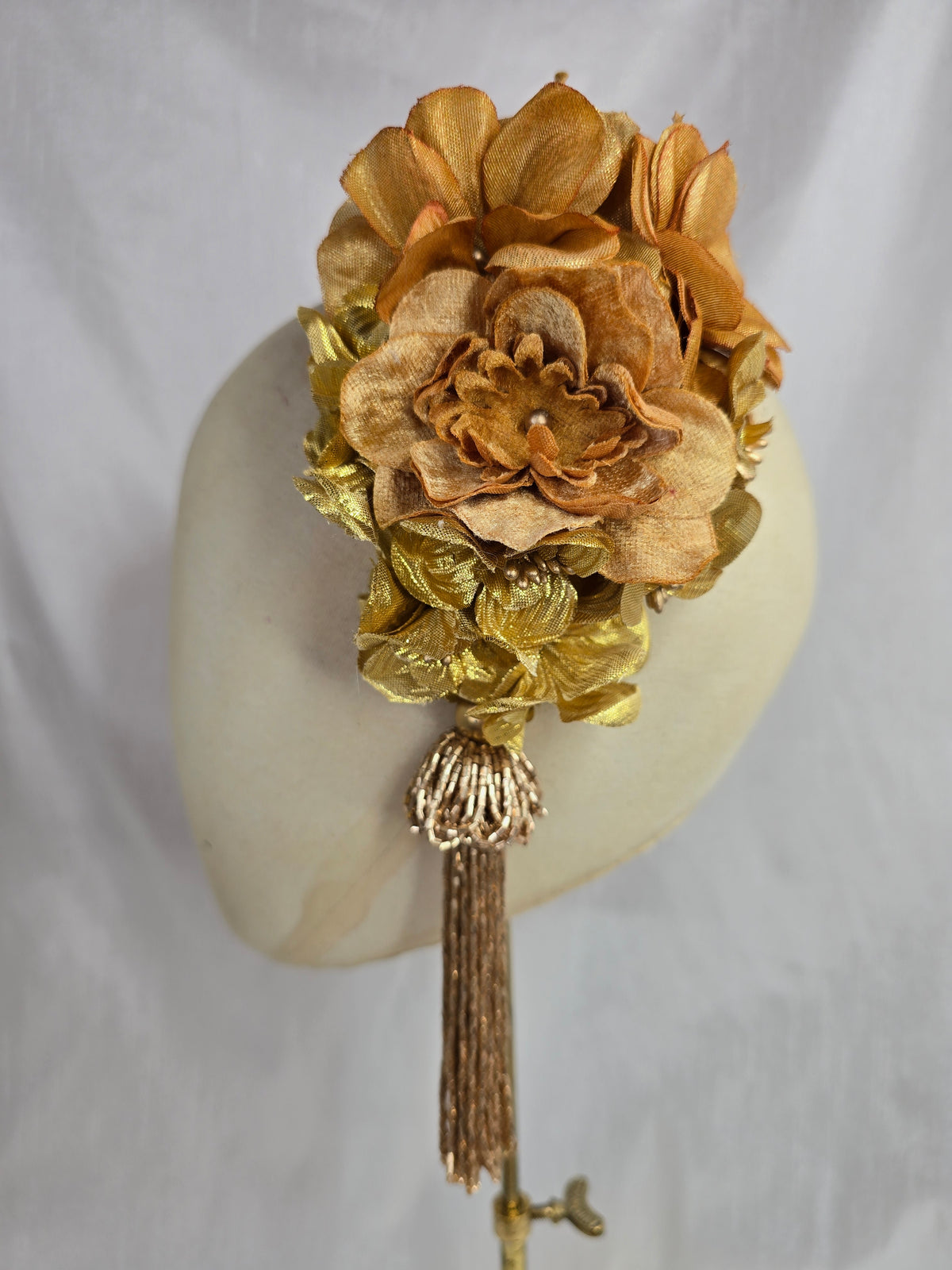 Medium autumn gold flower headpiece/corsage with beaded tassel