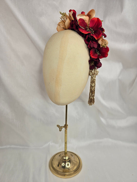 Large pale orange, red and gold flower headpiece with gold beaded tassel