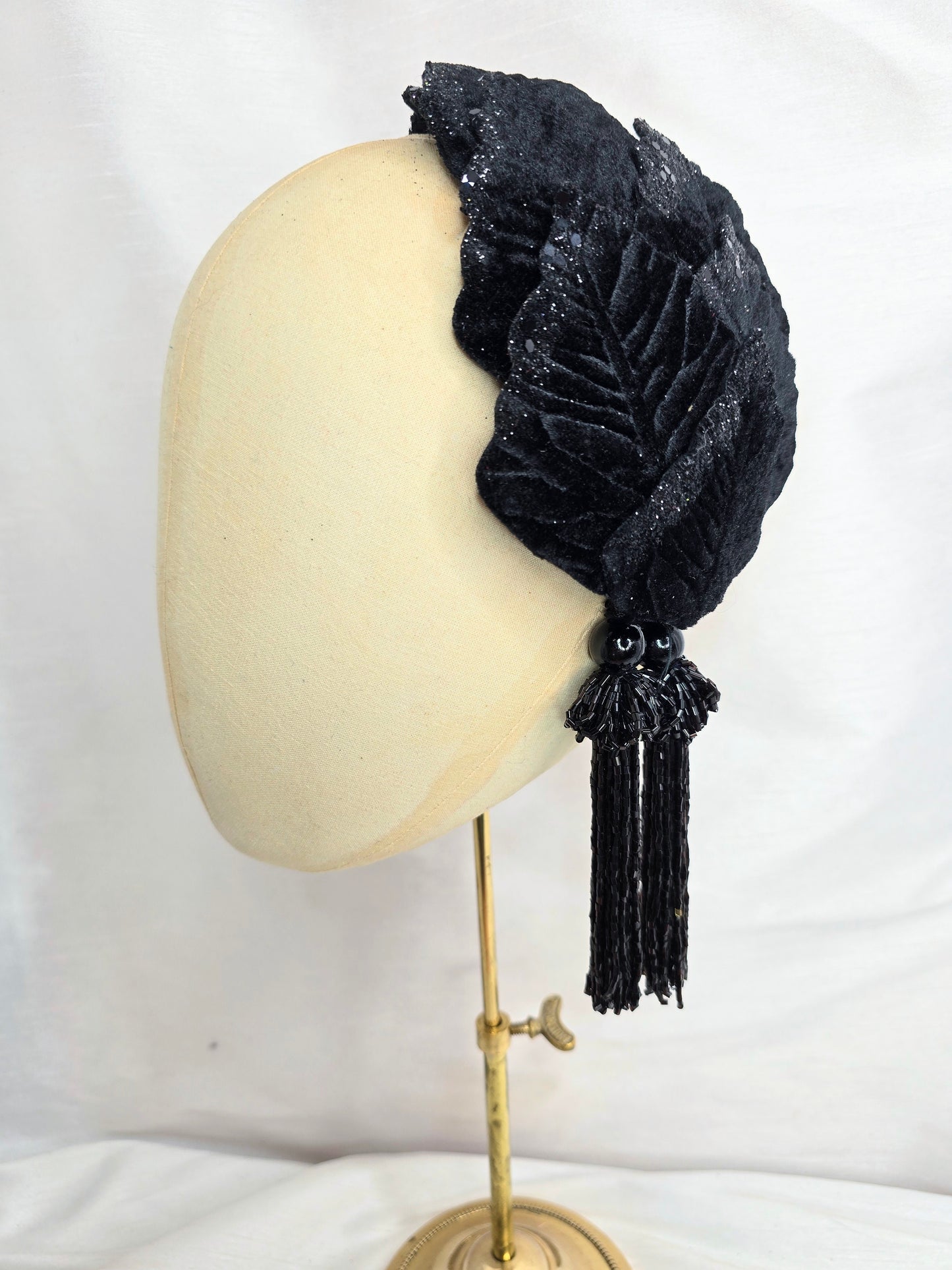 Black velvet glittered half hat/fascinator with black beaded tassels