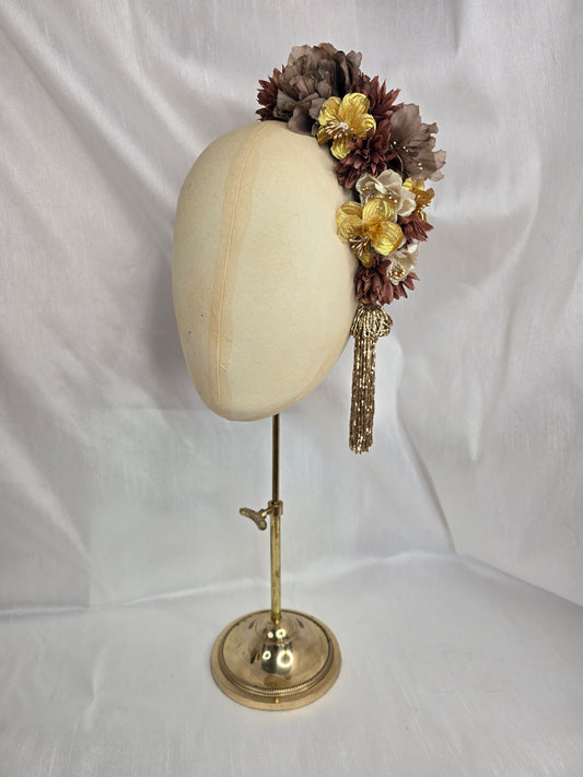 Brown and gold large headpiece with gold beaded tassel