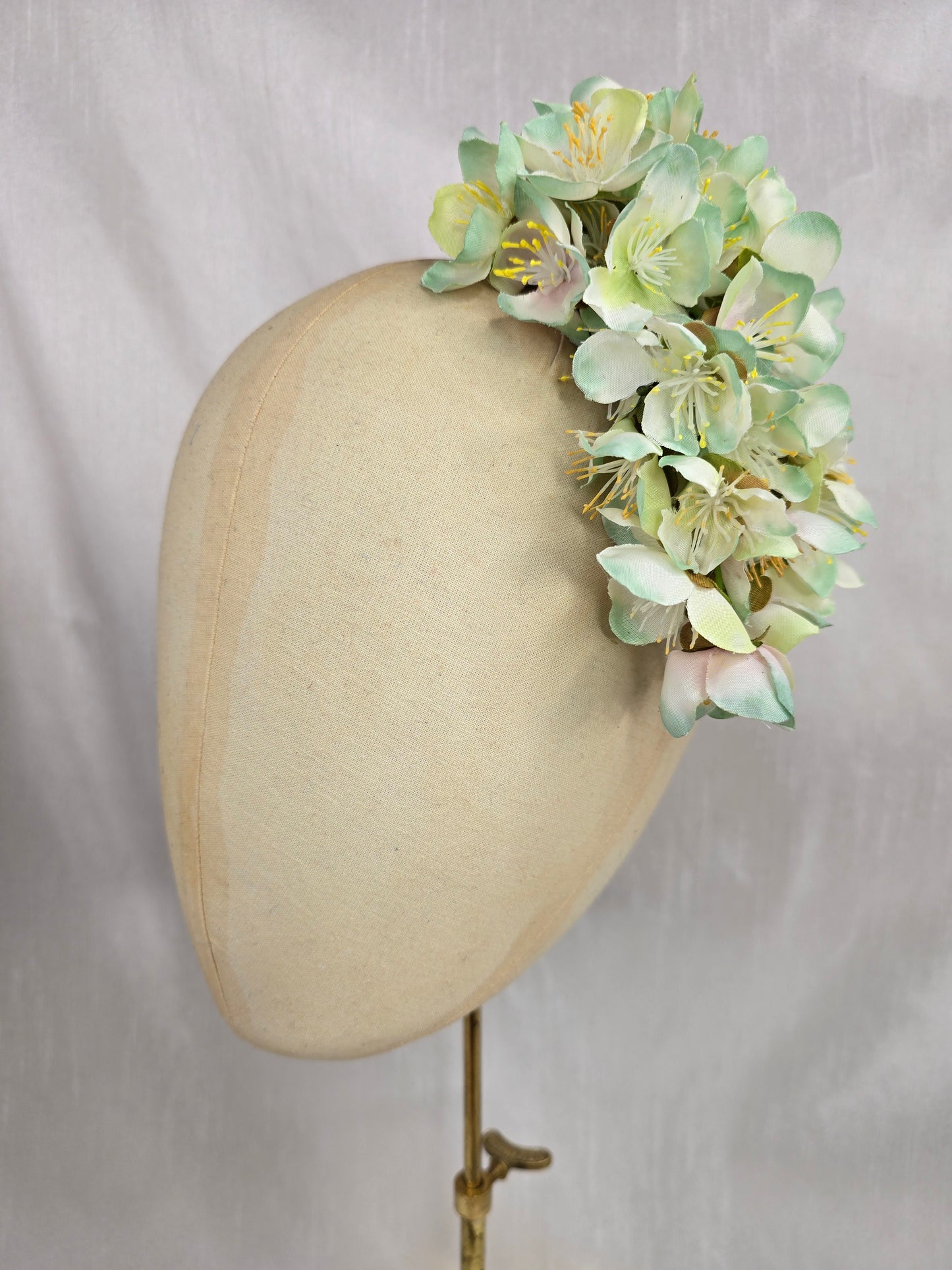 Large pale green cherry blossom hair flower